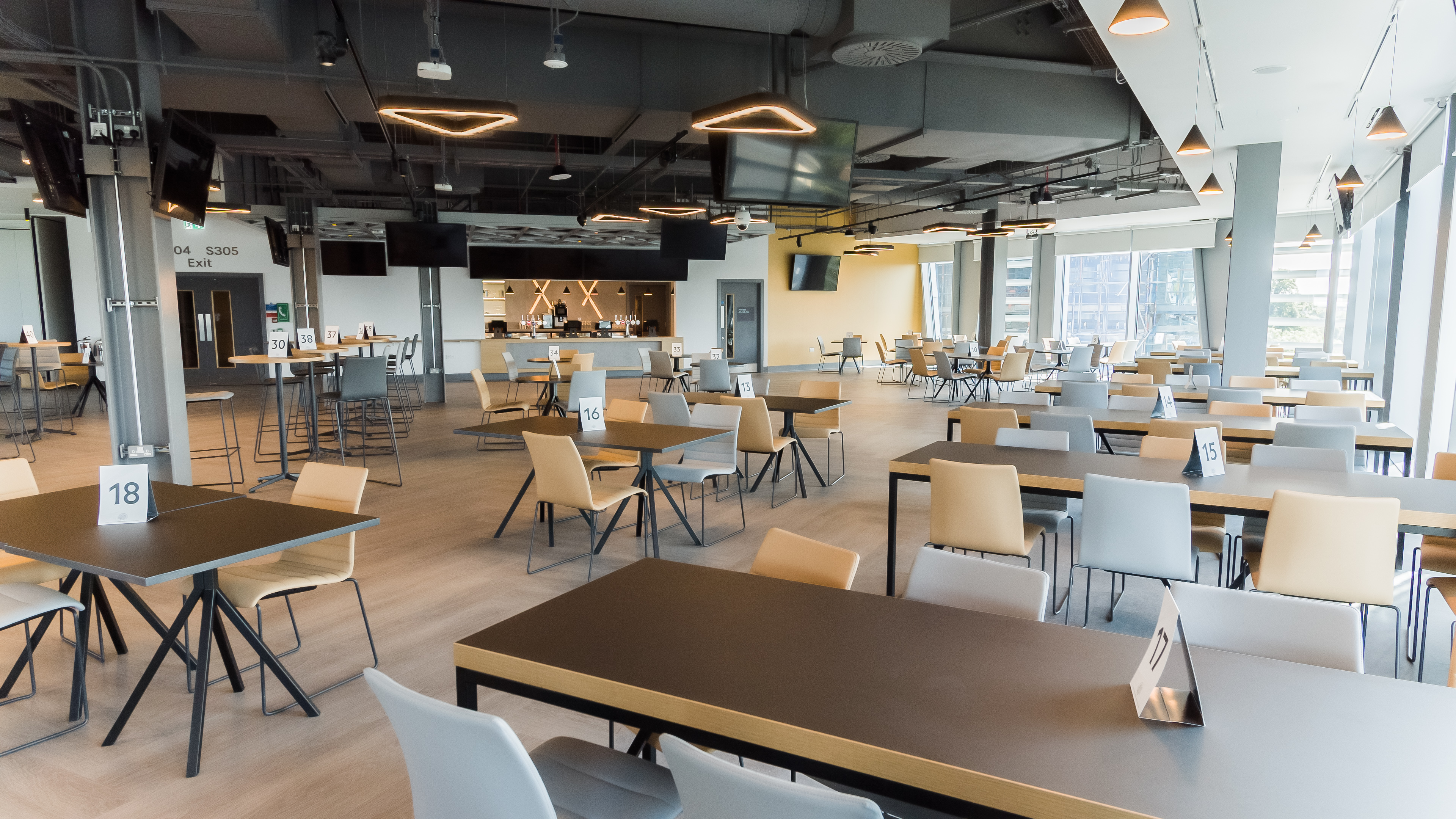 Modern event space at Brentford FC with flexible seating for meetings and gatherings.
