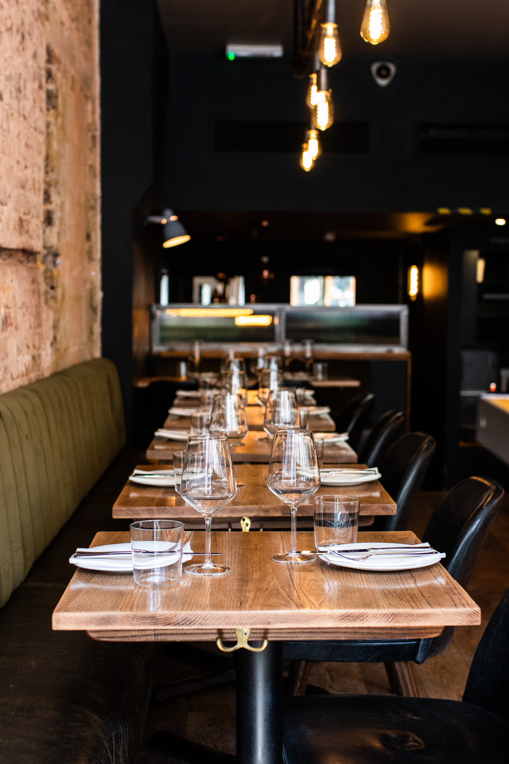 Stylish restaurant setup in The Charcol Room, ideal for intimate gatherings and corporate dinners.