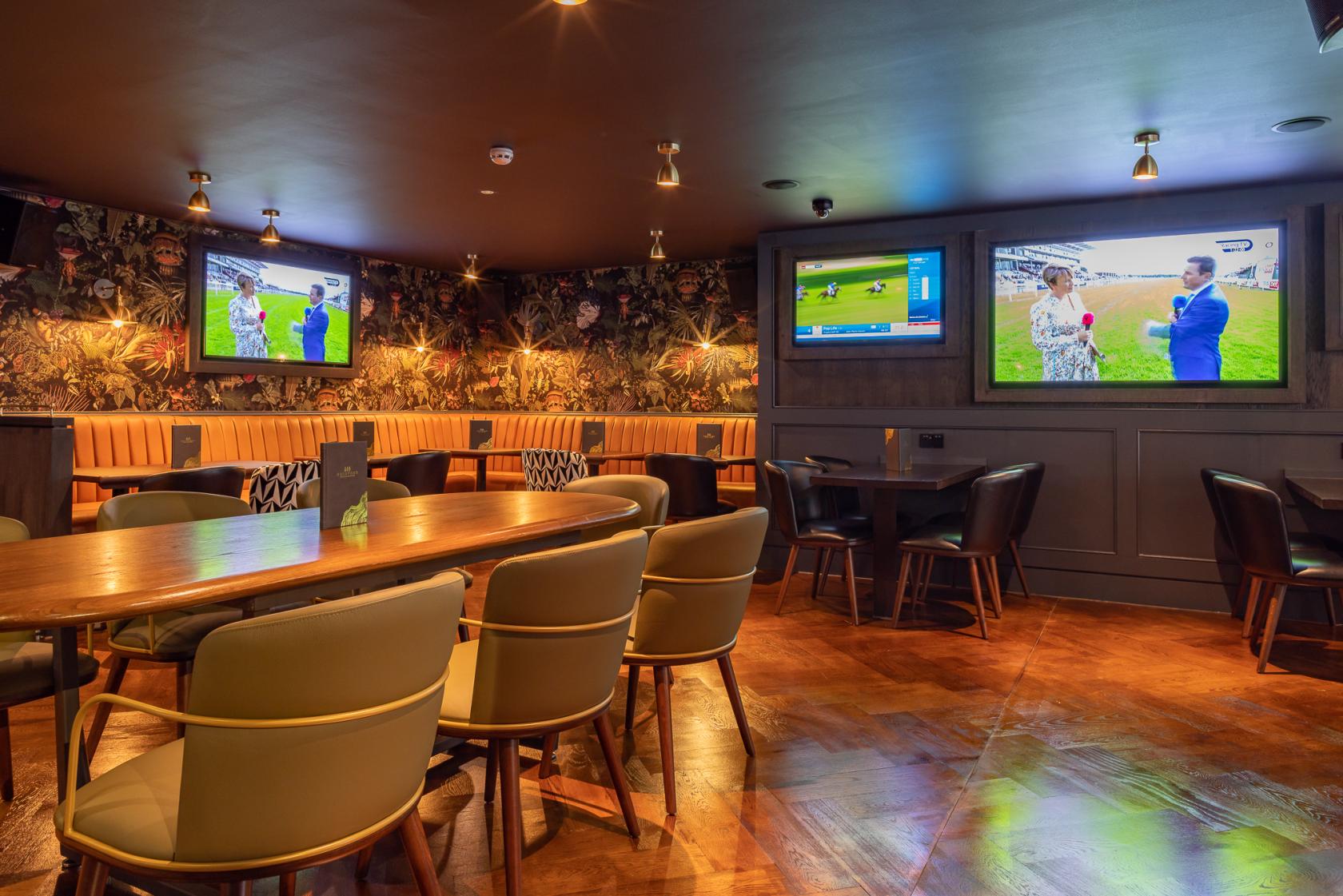 Modern Mezzanine event space in Goldwood Spots Pub, ideal for corporate meetings and watch parties.