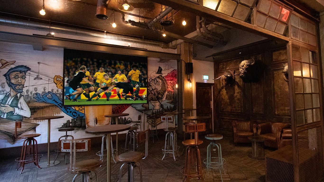 Bison Room at Long Arm Brewery: vibrant venue for casual events and live sports.