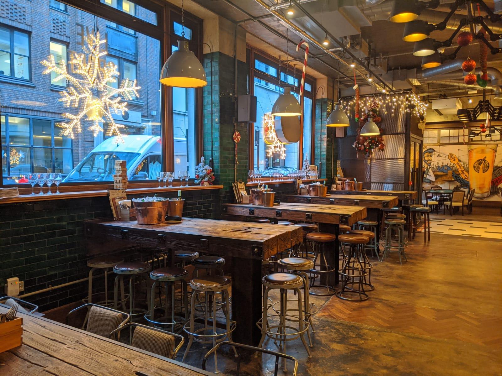 Cozy venue hire at Long Arm Brewery with rustic decor for casual meetings and events.