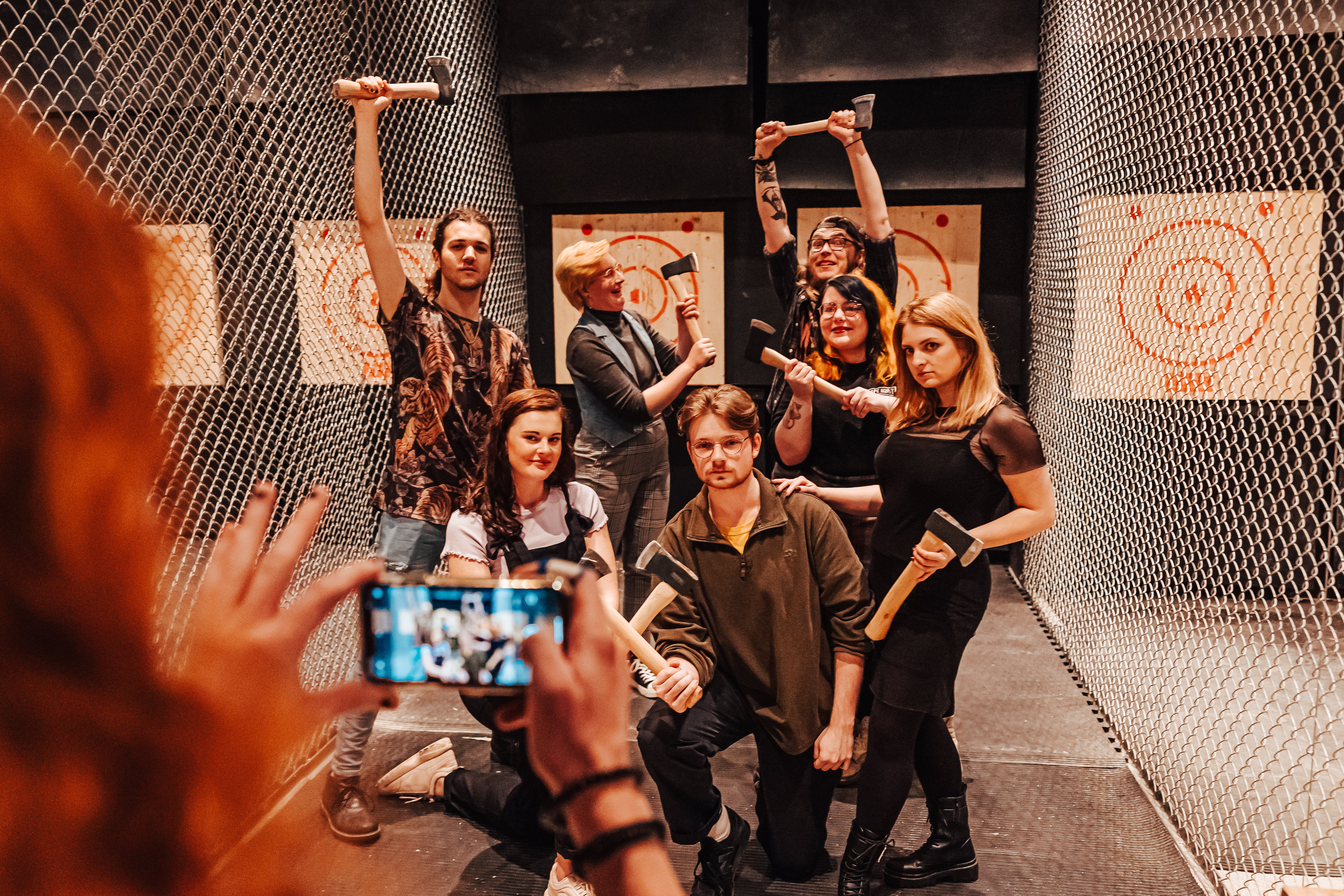 Team-building axe throwing event at Whistle Punks, Oxford Circus, fostering collaboration.