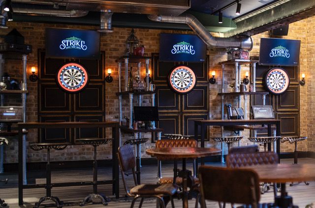 Vibrant Camden Records studio with dartboards for team-building and networking events.