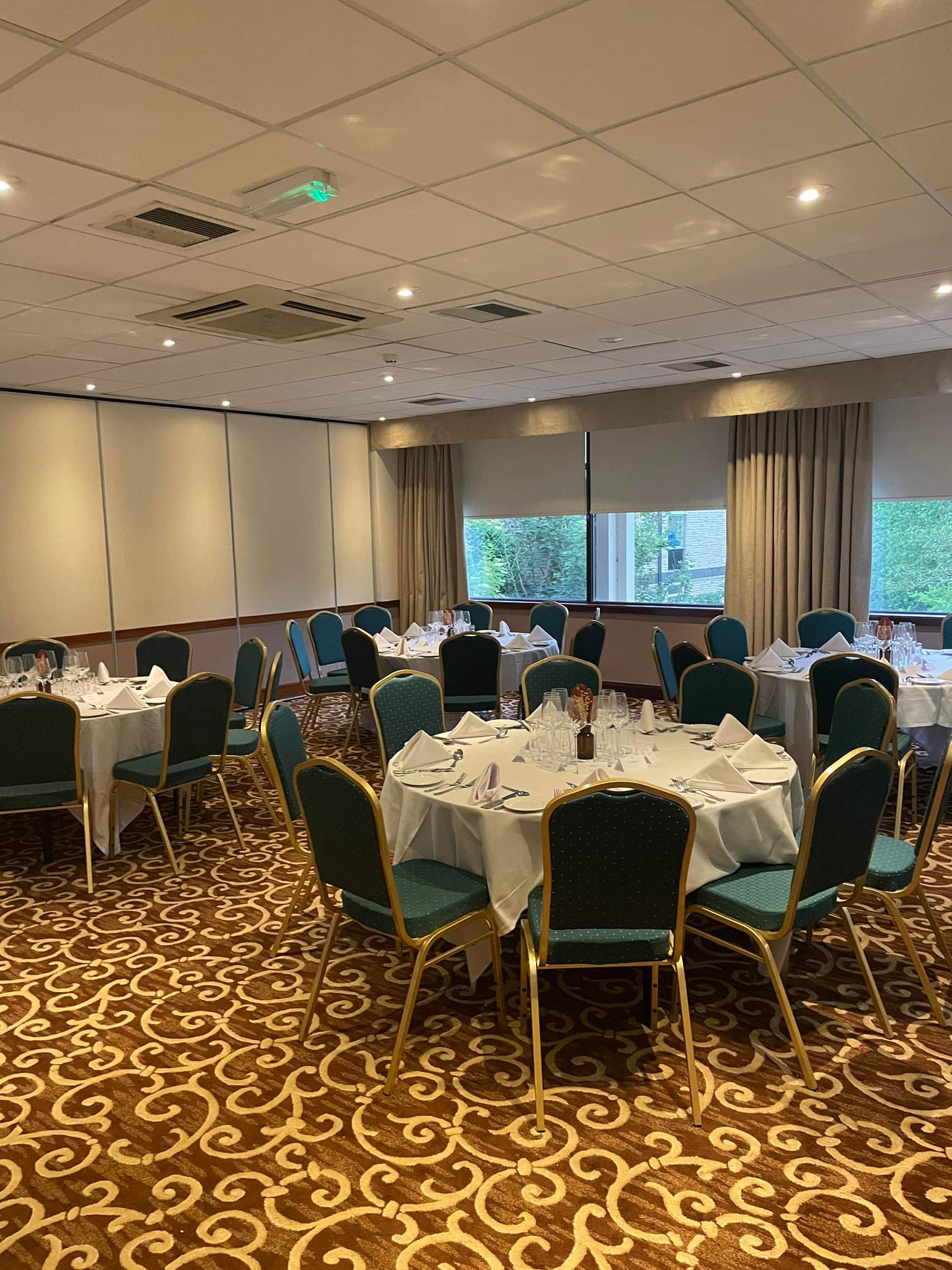 Event space at Leeds Bradford Airport Hotel with elegant dining setup for corporate gatherings.