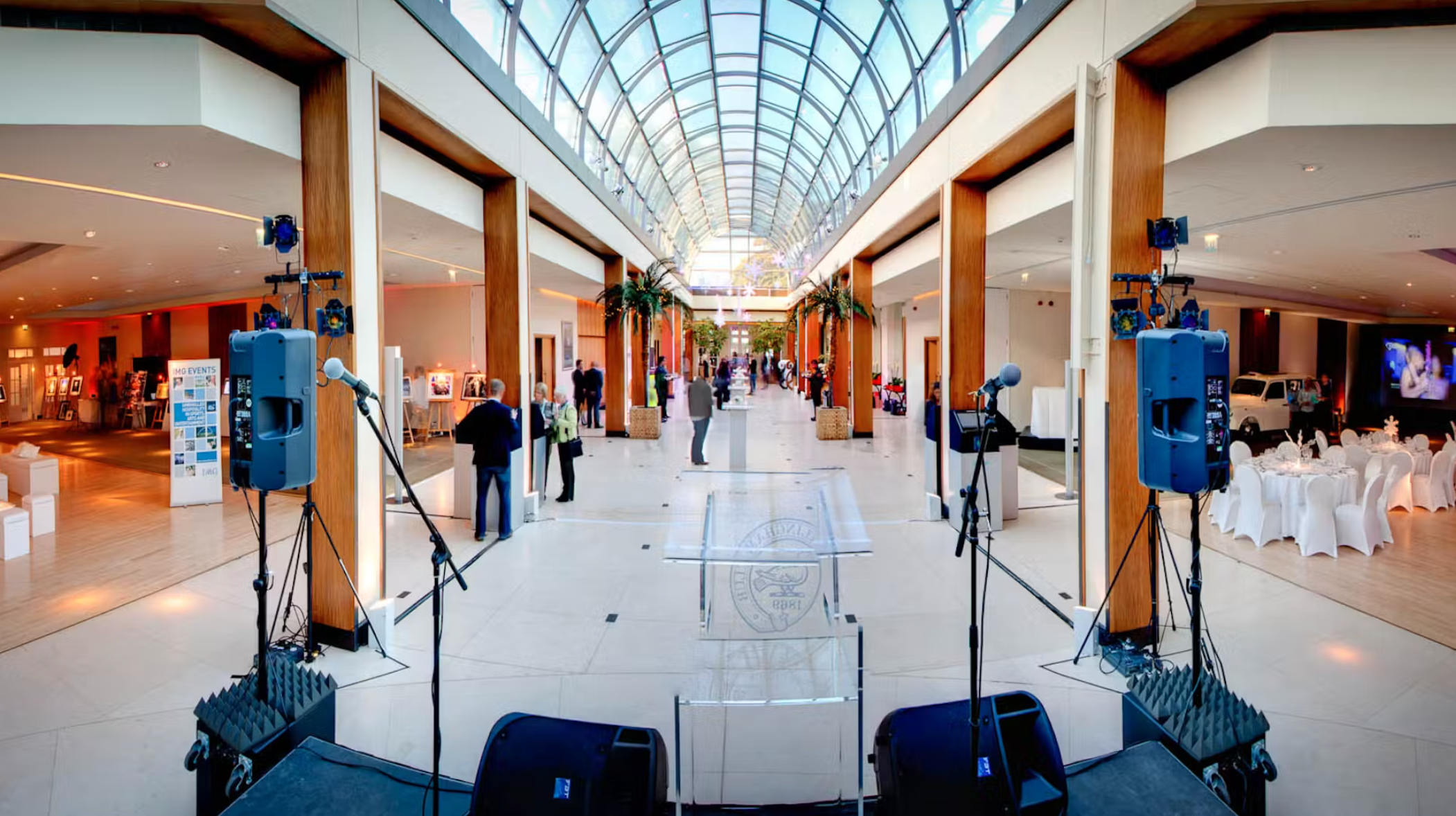 Palm Court at Hurlingham Club: spacious venue with glass roofing for corporate events.