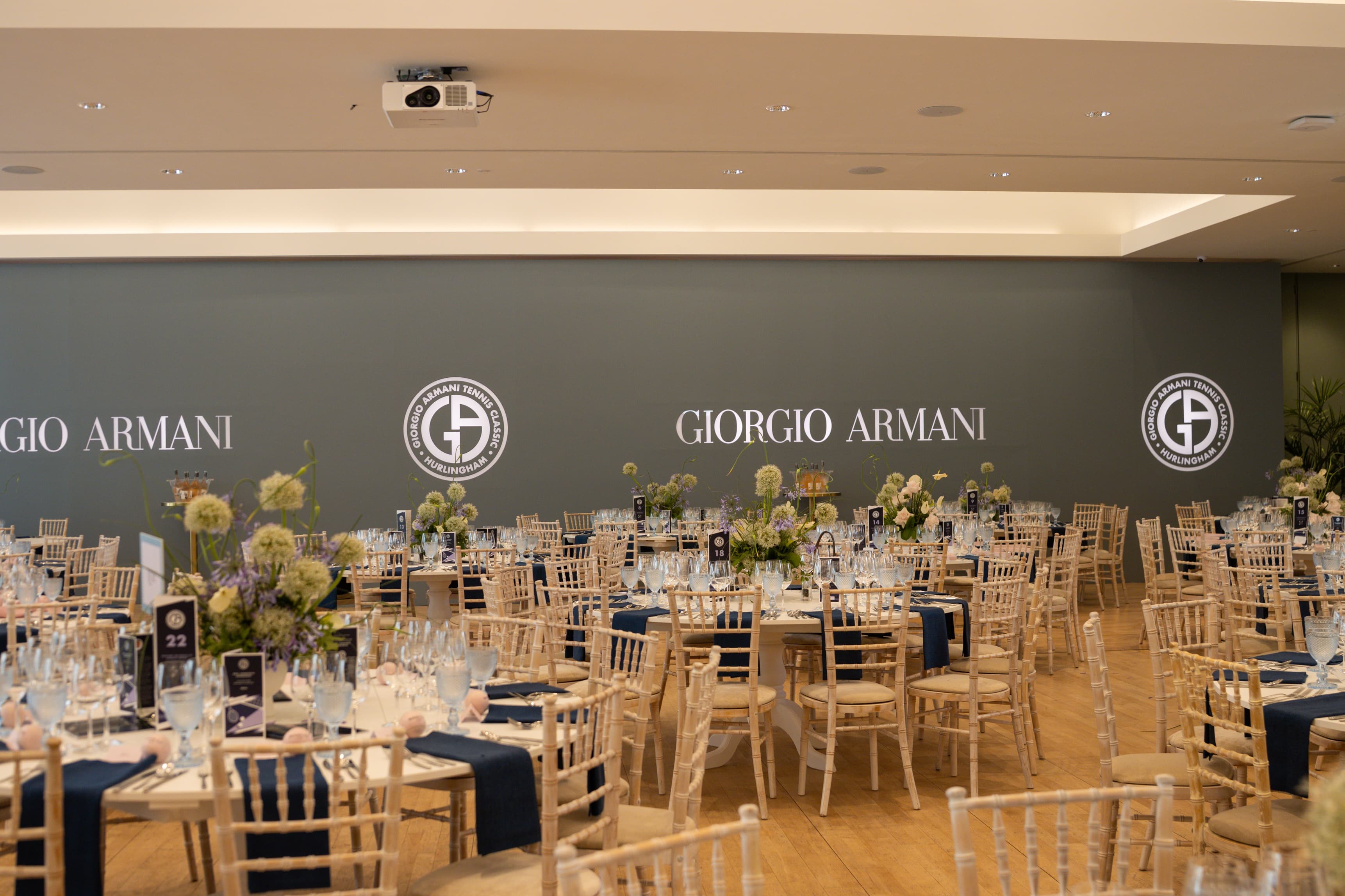 Luxury gala setup at The Hurlingham Club with floral decor for brand activation event.