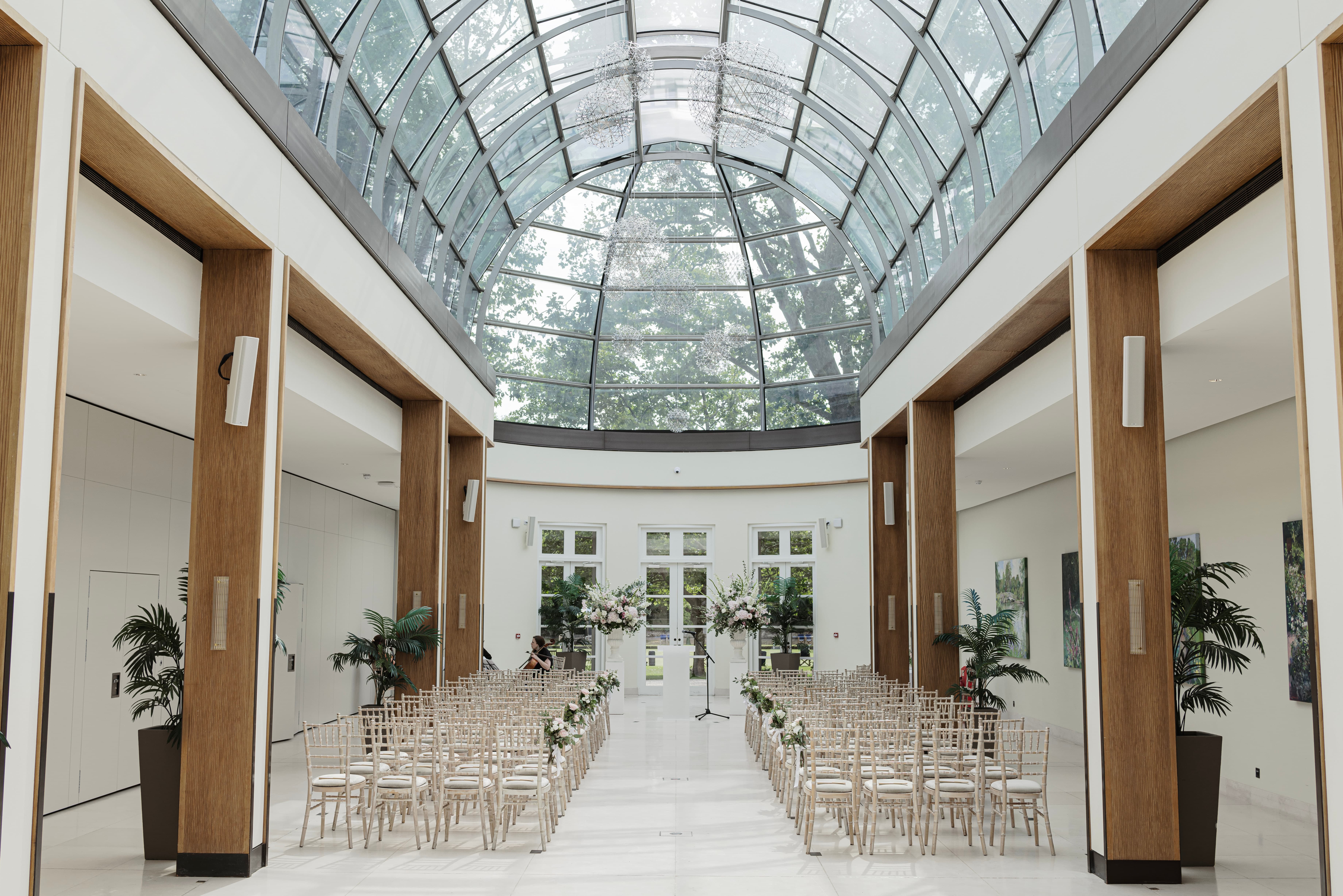 Hurlingham Club Palm Court with barrel-vaulted ceiling for luxury wedding ceremony and gala event.