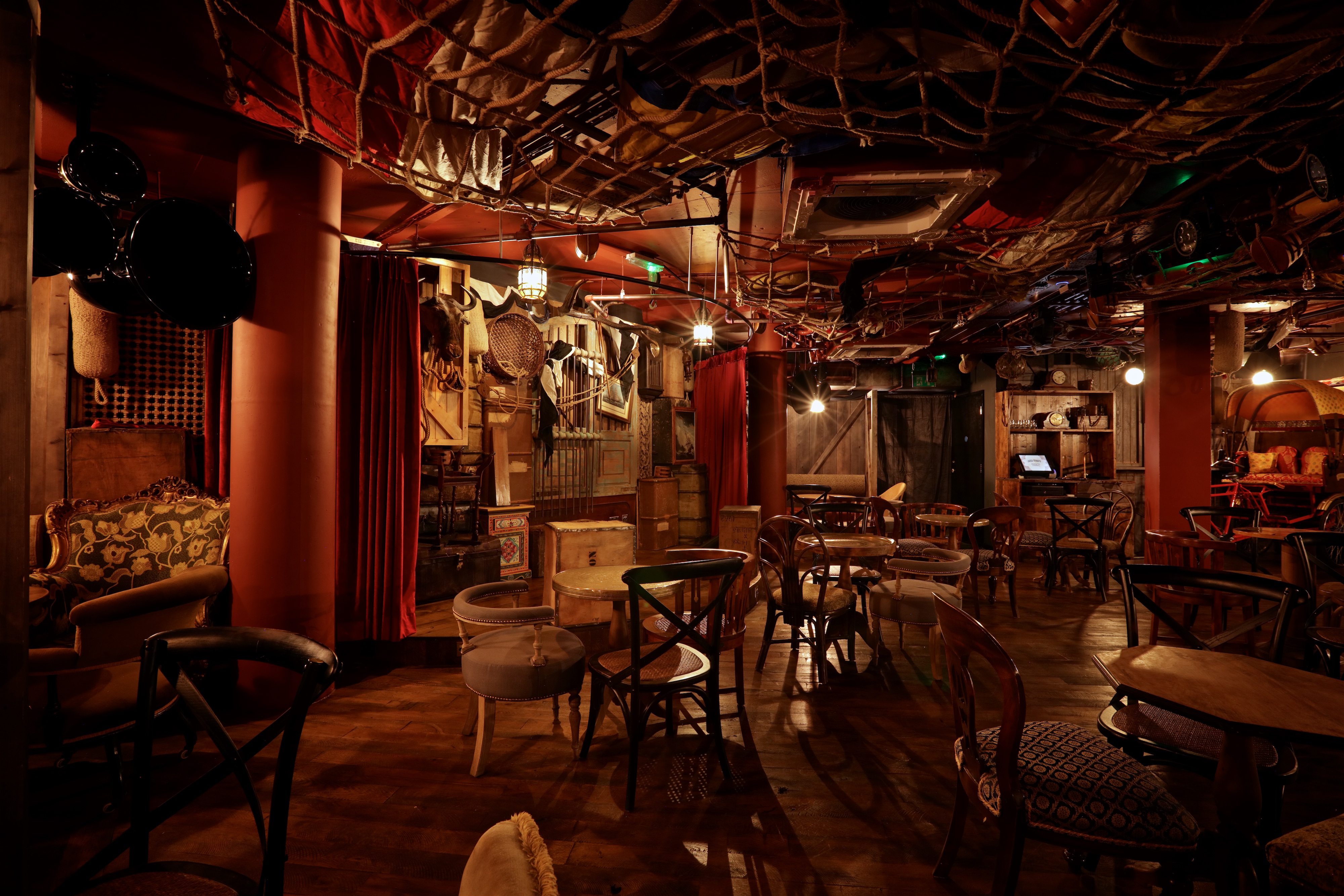 Cozy Luggage Room at Mr Fogg's, perfect for intimate gatherings and themed events.