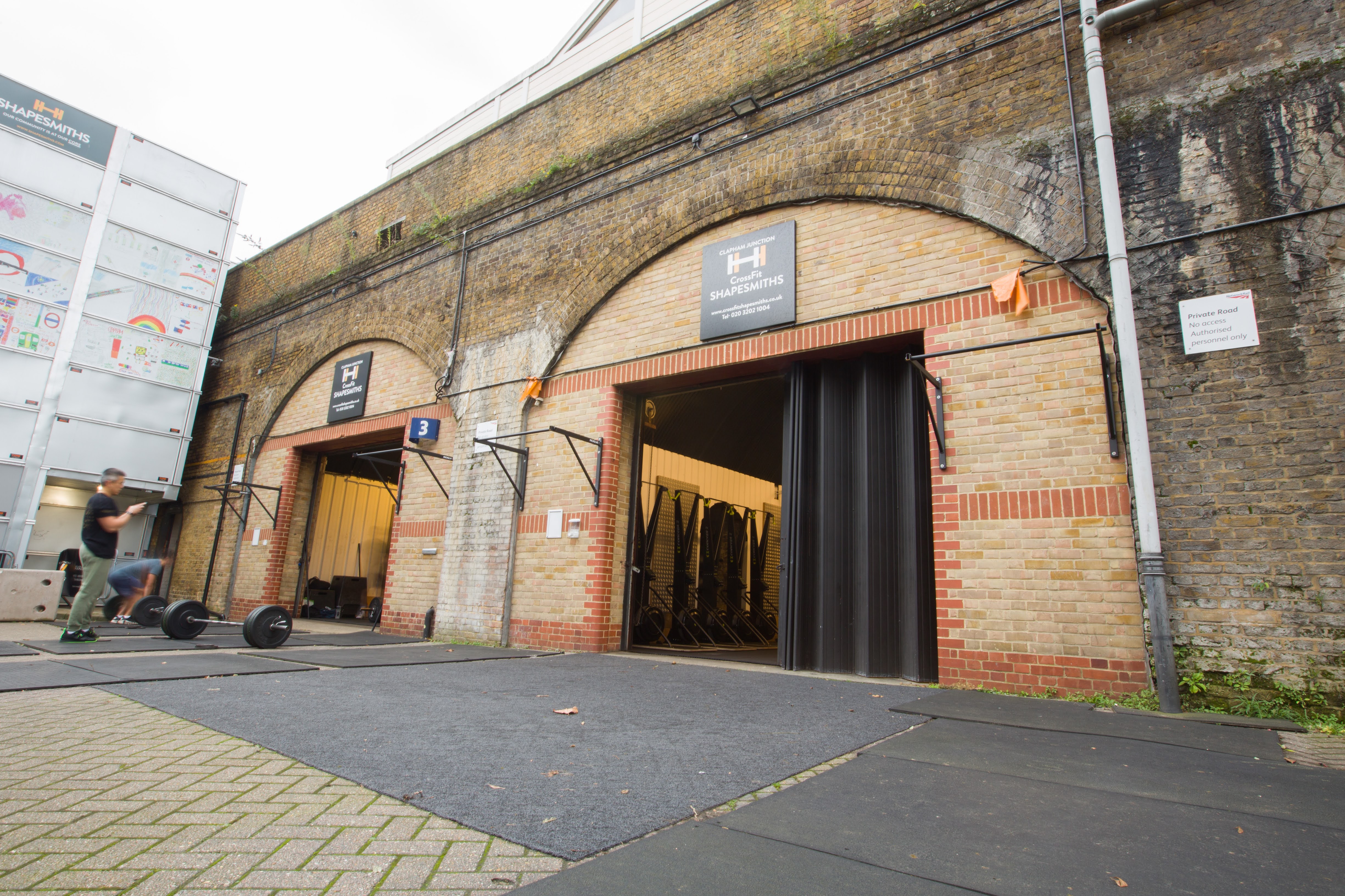 CrossFit Shapesmiths venue with arched entrances for fitness and corporate events.