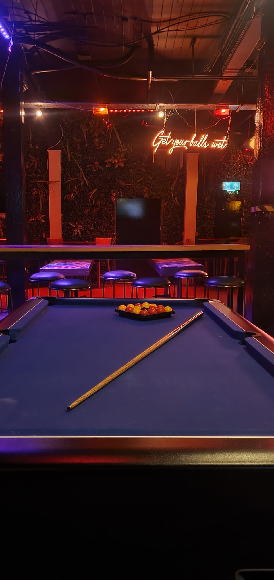 Vibrant Shack Bar and Grill with pool table for networking events and team-building.