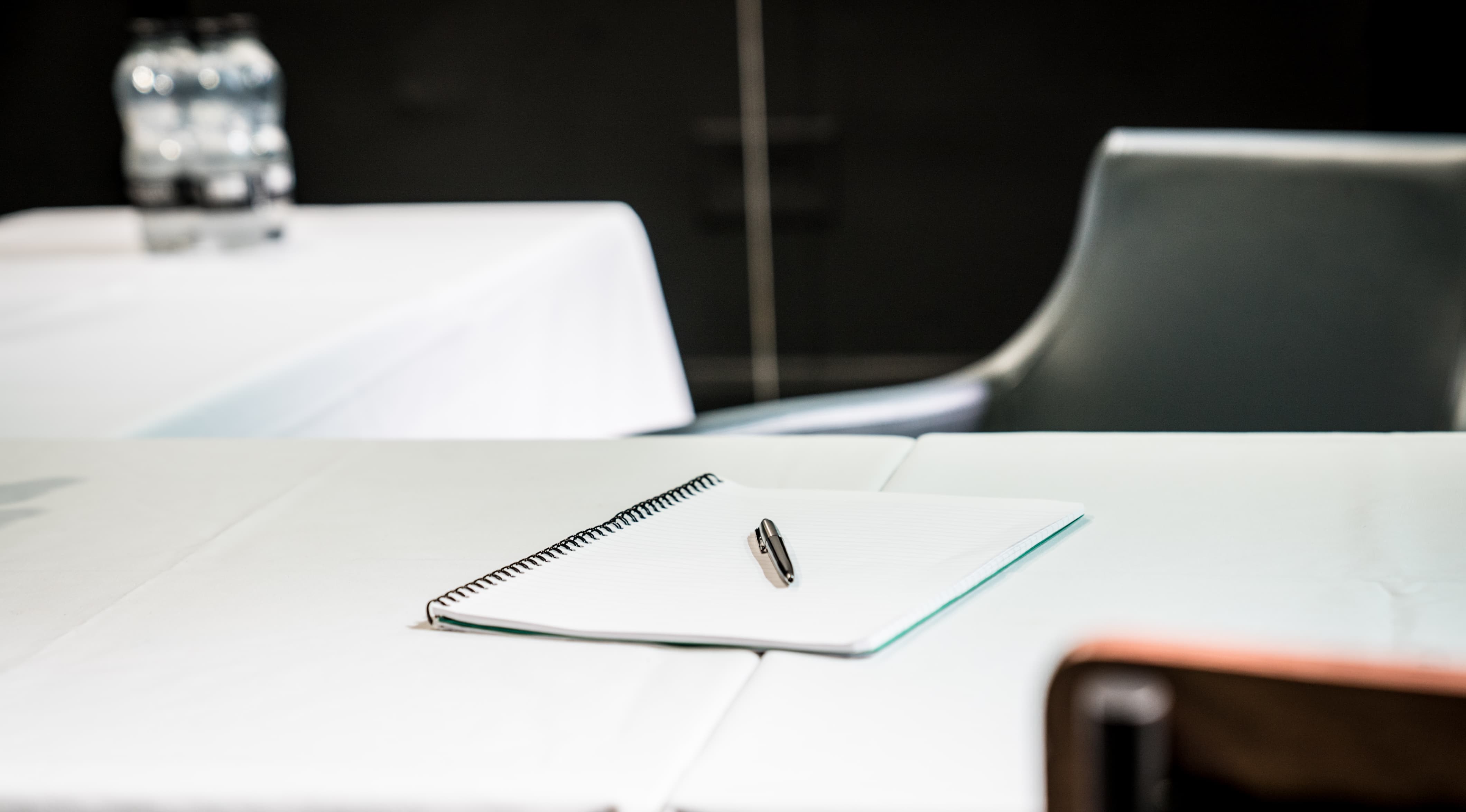 Corporate hire room in Brixton Jamm with minimalist meeting setup for conferences.