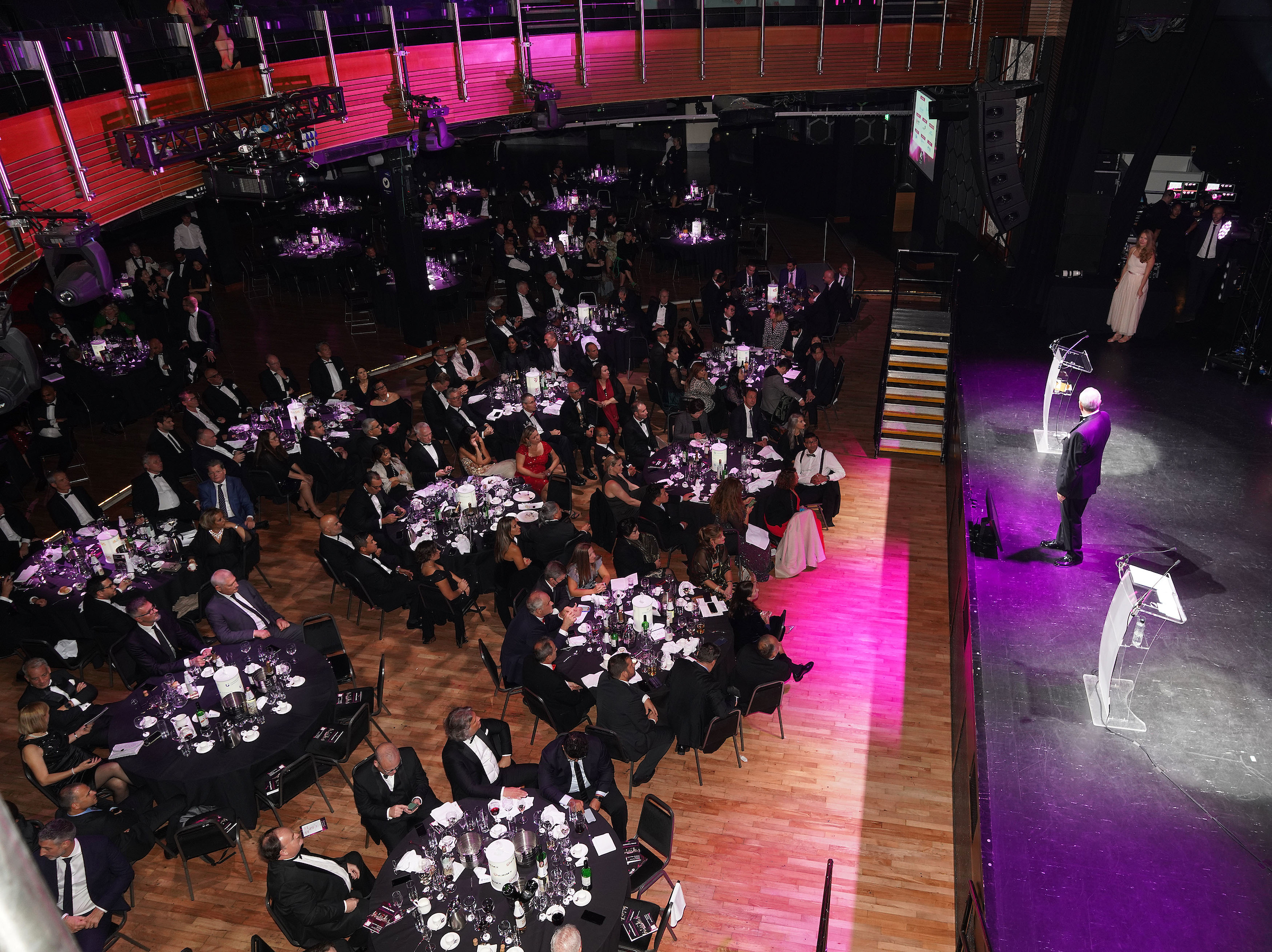 Gala event at The O2 with elegant tables and stage, perfect for networking and celebration.