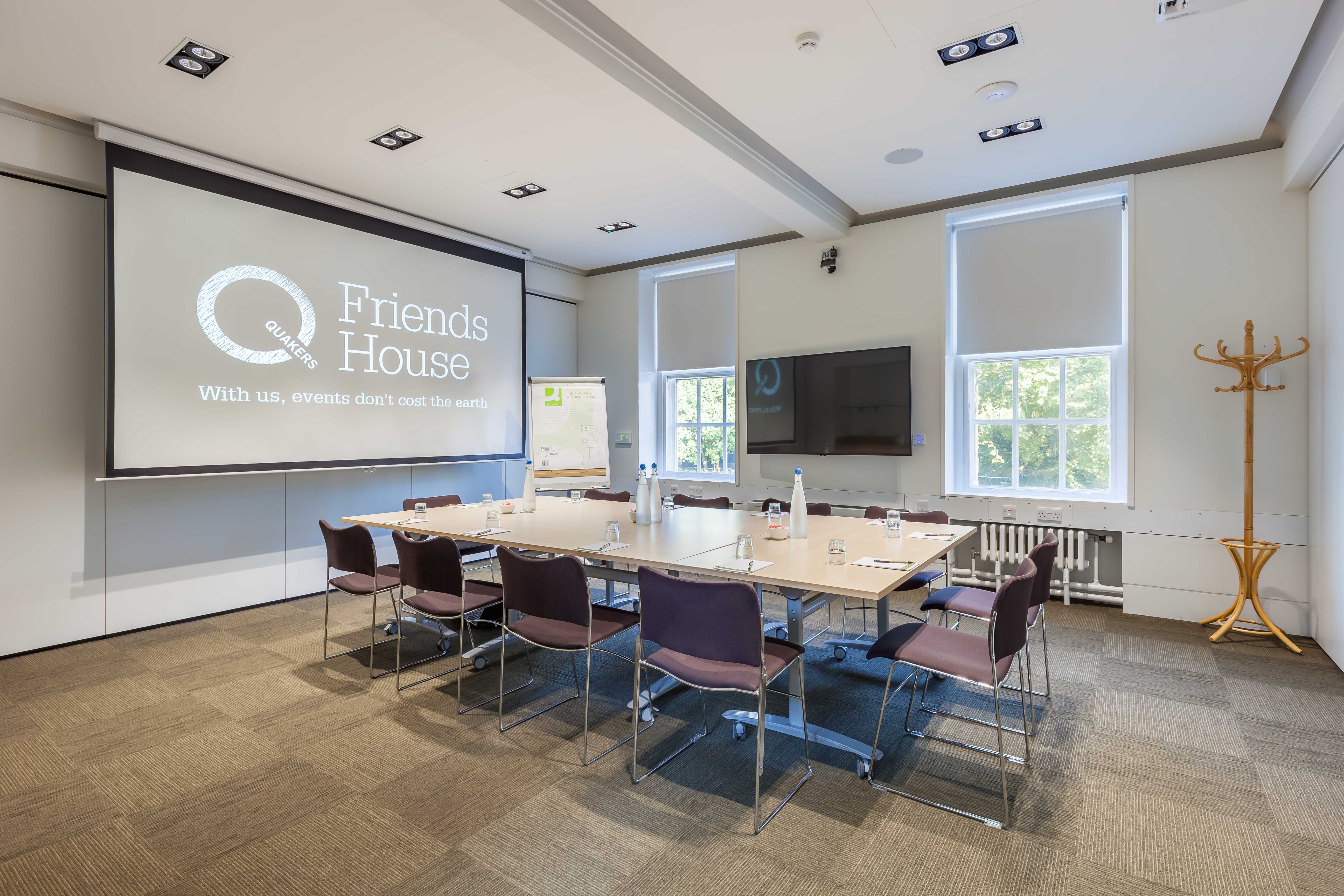 Hilda Clark Suite meeting room with large table, ideal for workshops and strategic meetings.