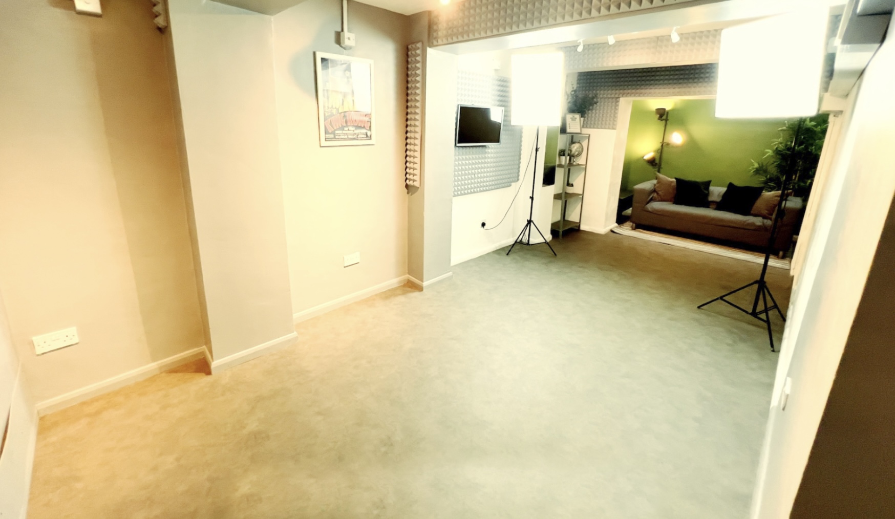 Versatile event space with modern aesthetics, ideal for meetings and workshops.