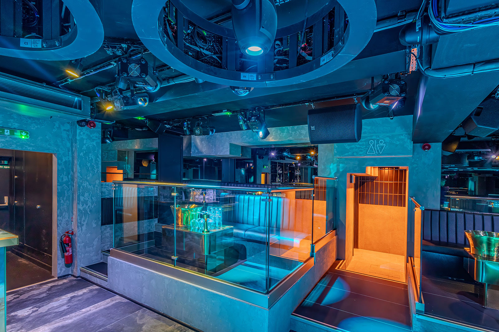 Modern event space with vibrant lighting, ideal for networking and celebrations.