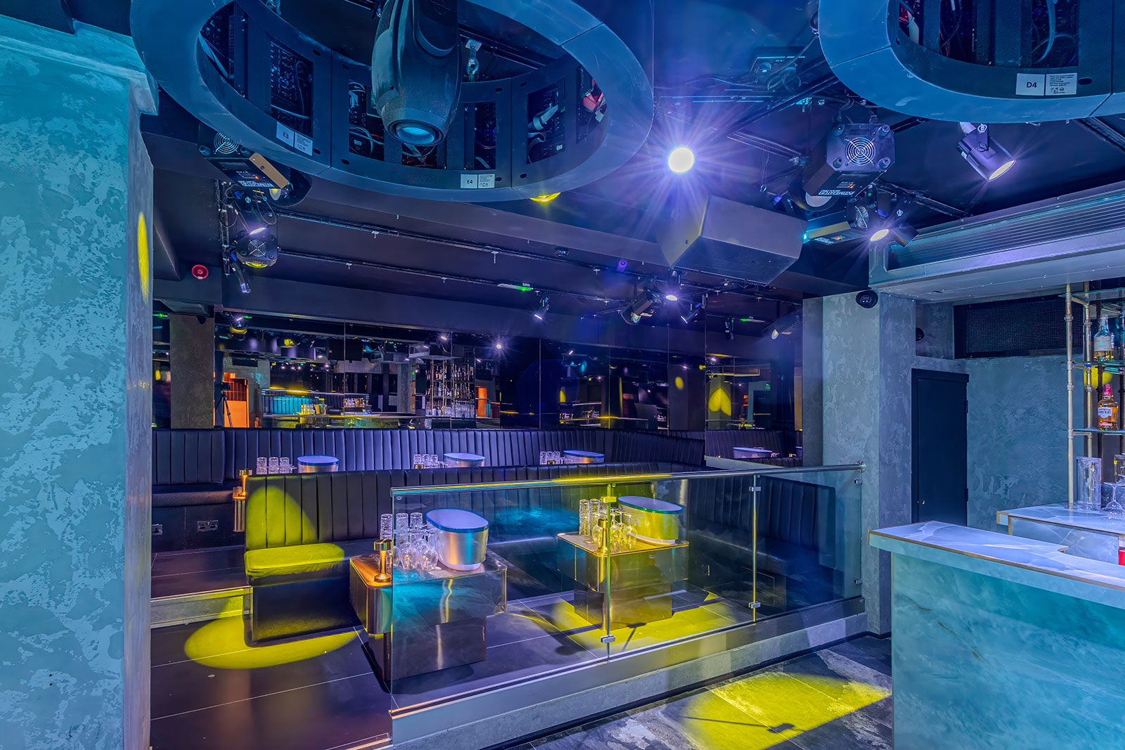 Modern event space with vibrant lighting, ideal for networking and celebrations.
