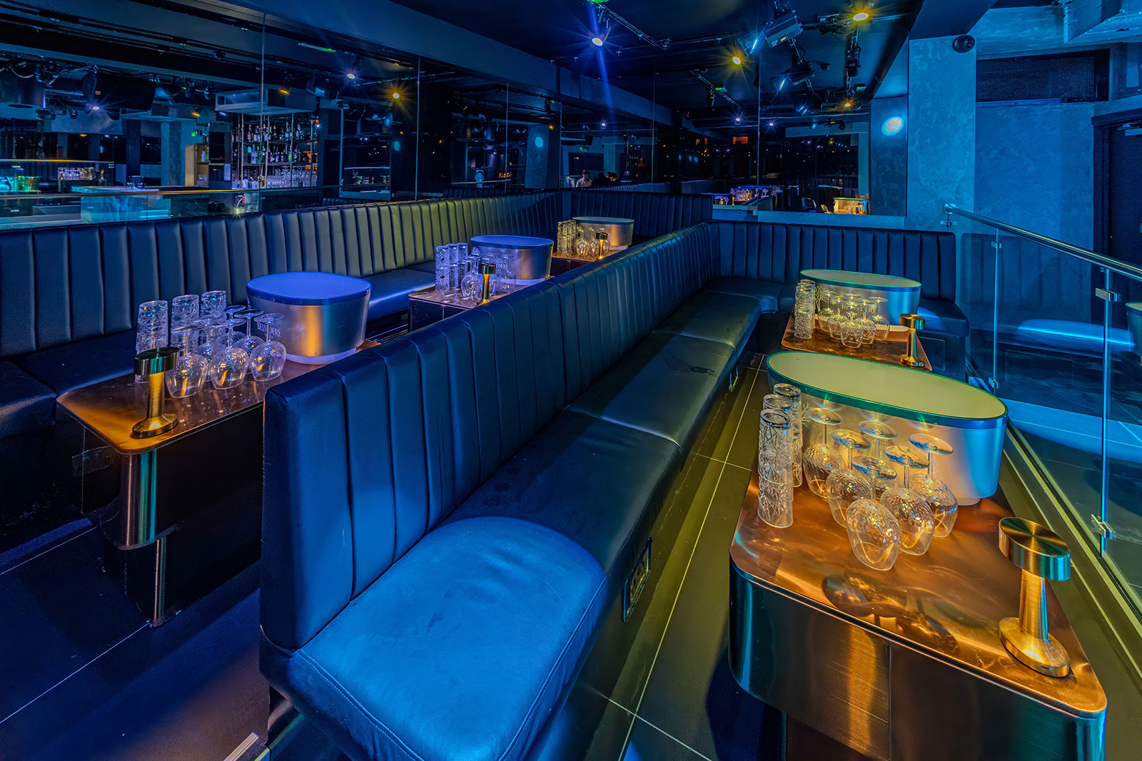 Sleek modern event space with plush seating for cocktail receptions and private parties.