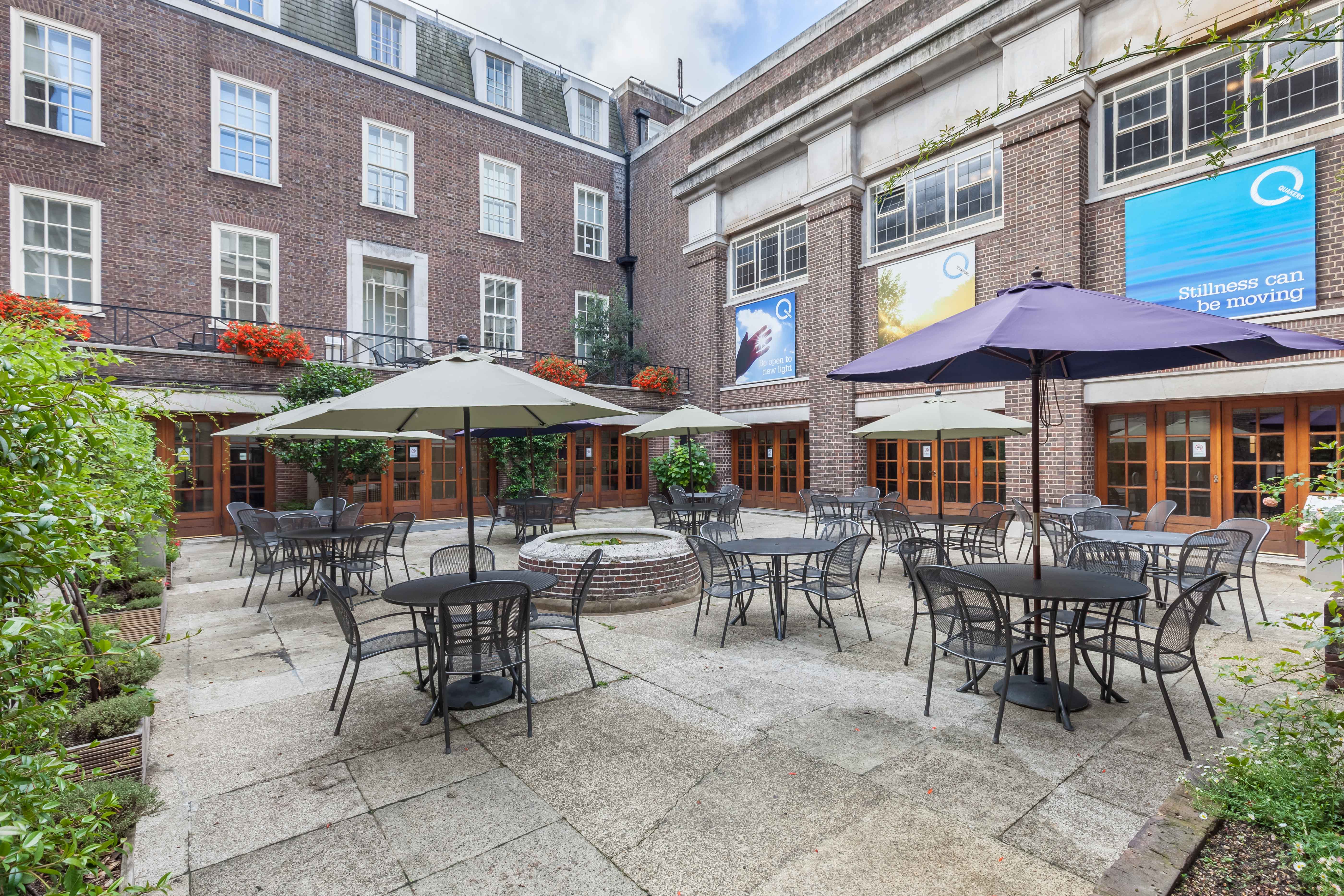 John Woolman in a charming outdoor courtyard for networking events and receptions.