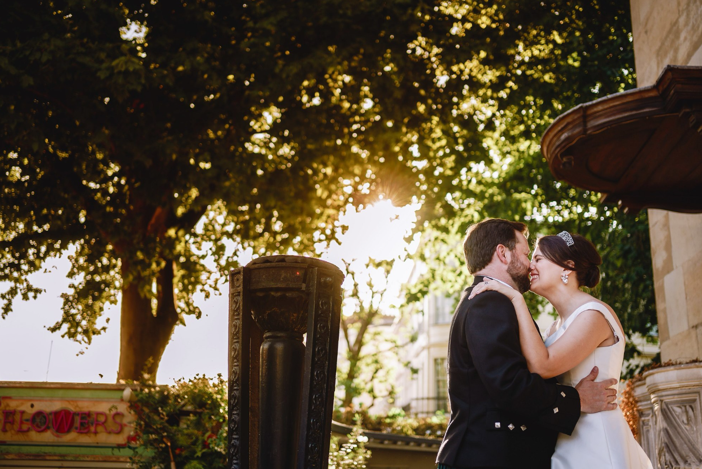 Joyful couple embracing in God's Garden, perfect for weddings and special events.