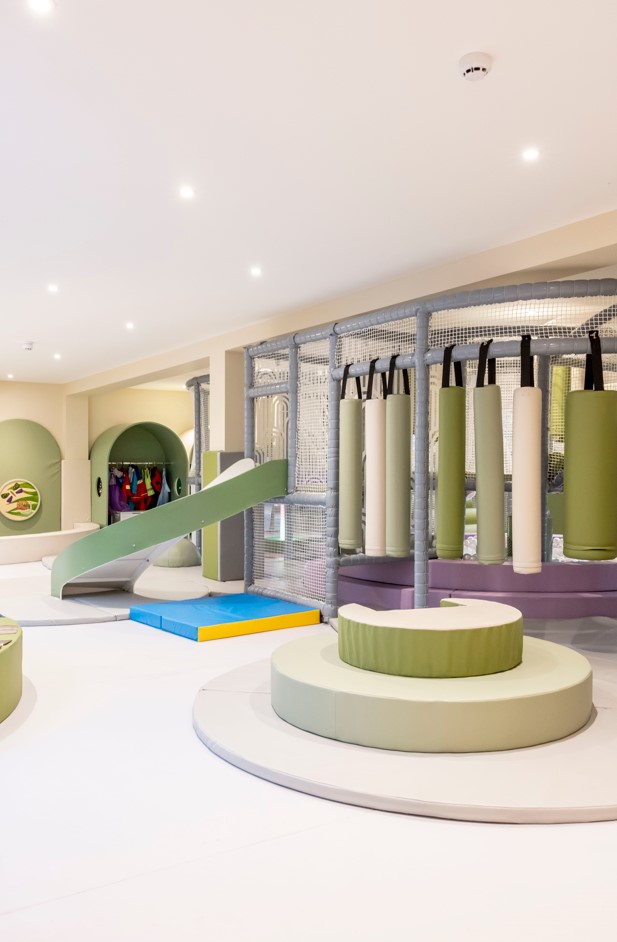 Vibrant children's play area with soft equipment for family-friendly events at Jaego's House.