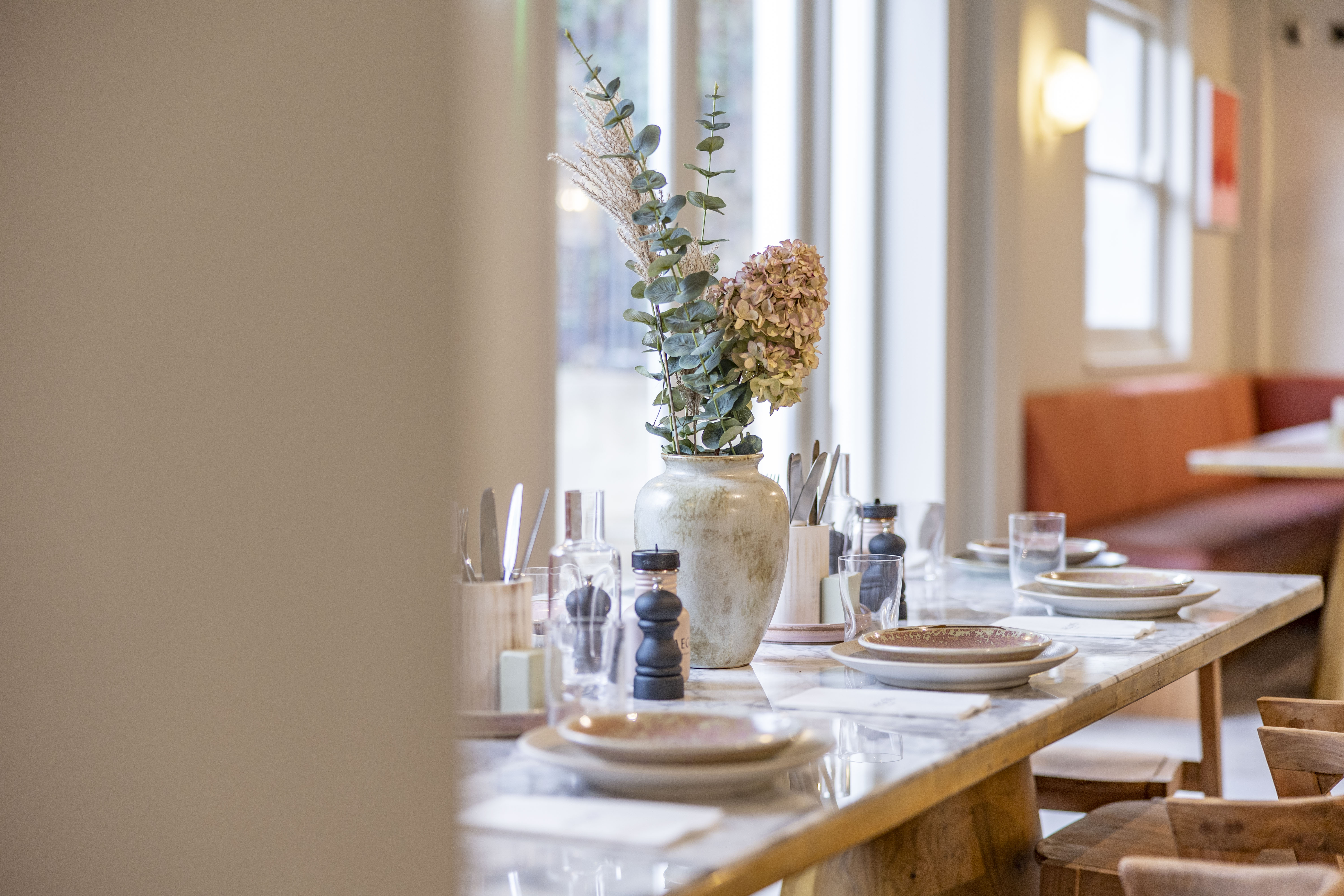 Elegant dining table setup in Jaego's House for corporate events and intimate gatherings.