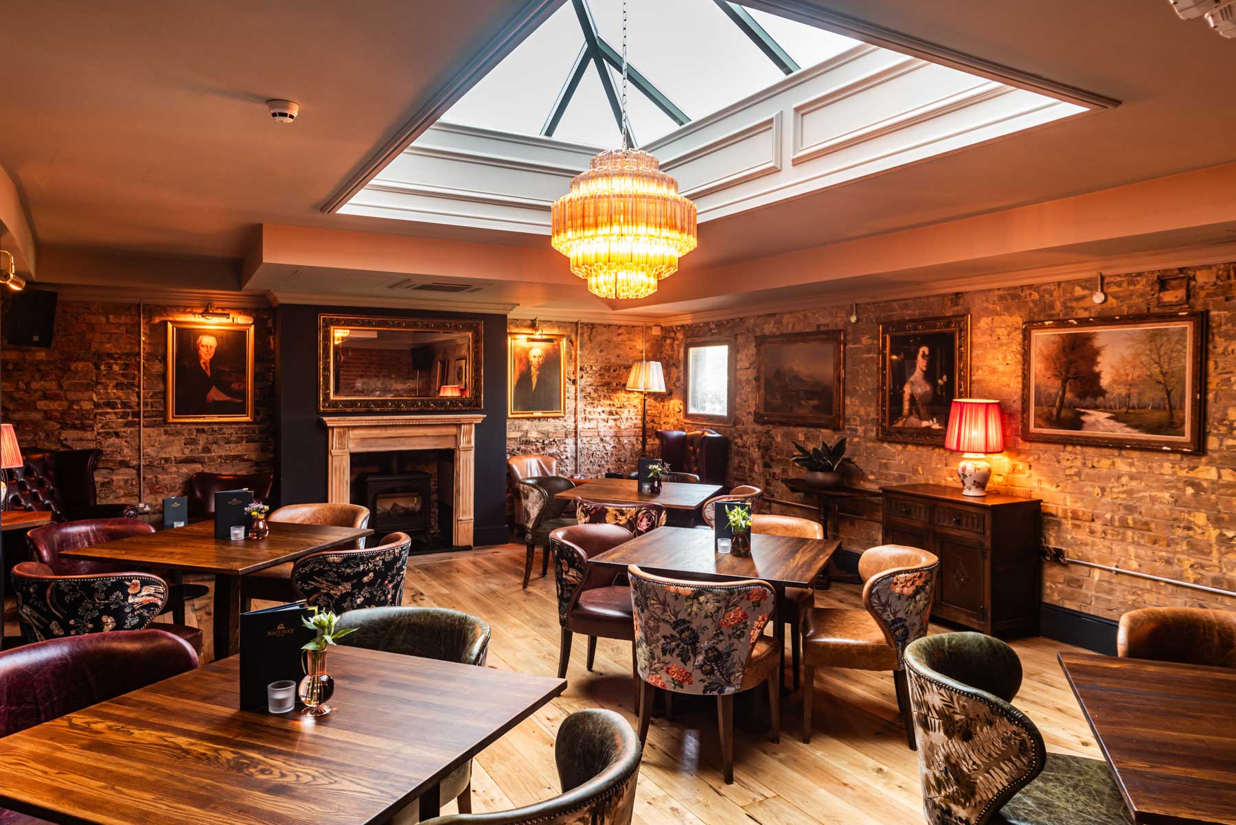 Stylish event space with warm lighting, ideal for gatherings and networking at The Railway.