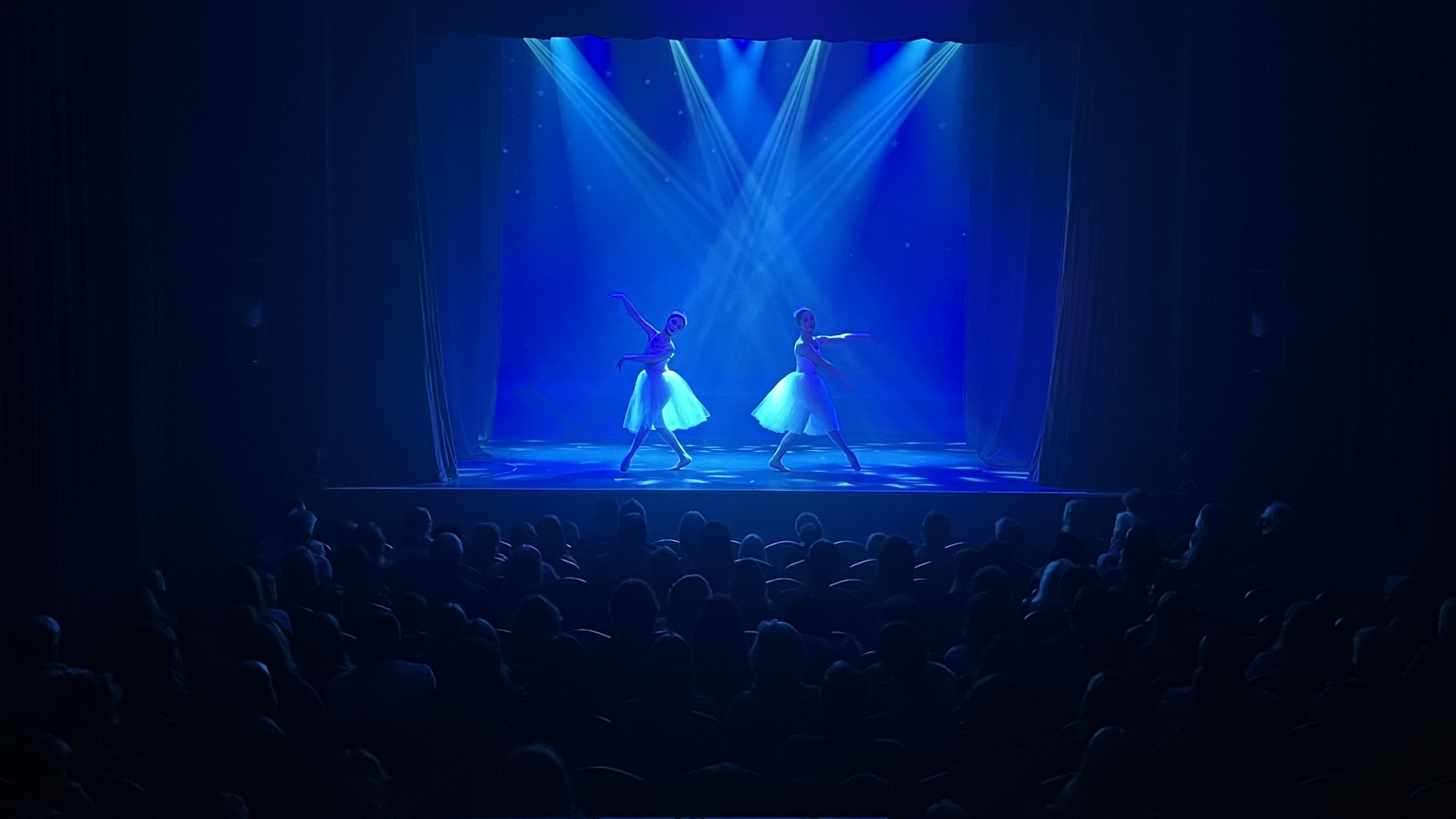 Esher Theatre stage performance with dancers in tutus, ideal for gala events.