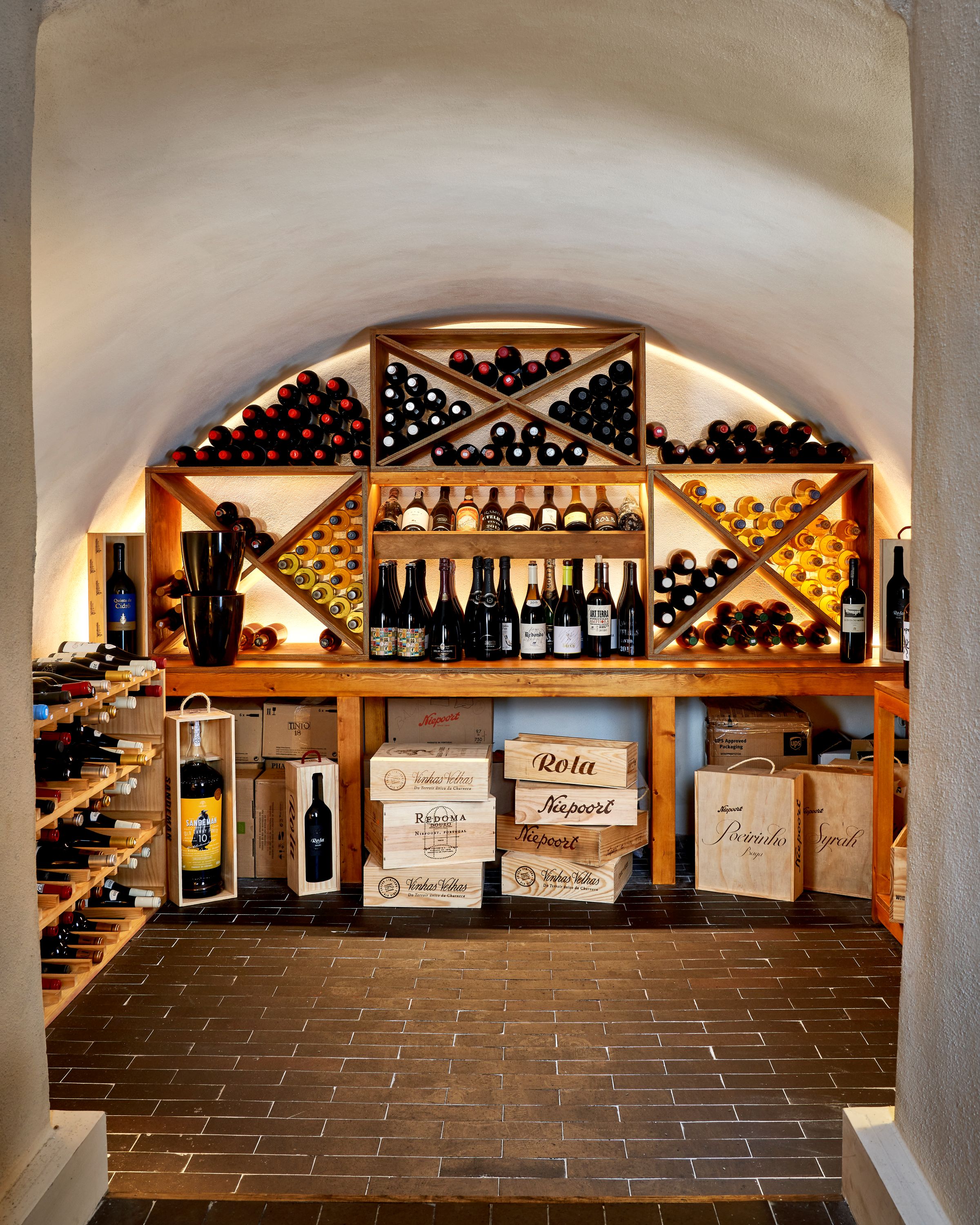 "Elegant wine cellar in Adega Private Dining Room for intimate tastings and upscale events."
