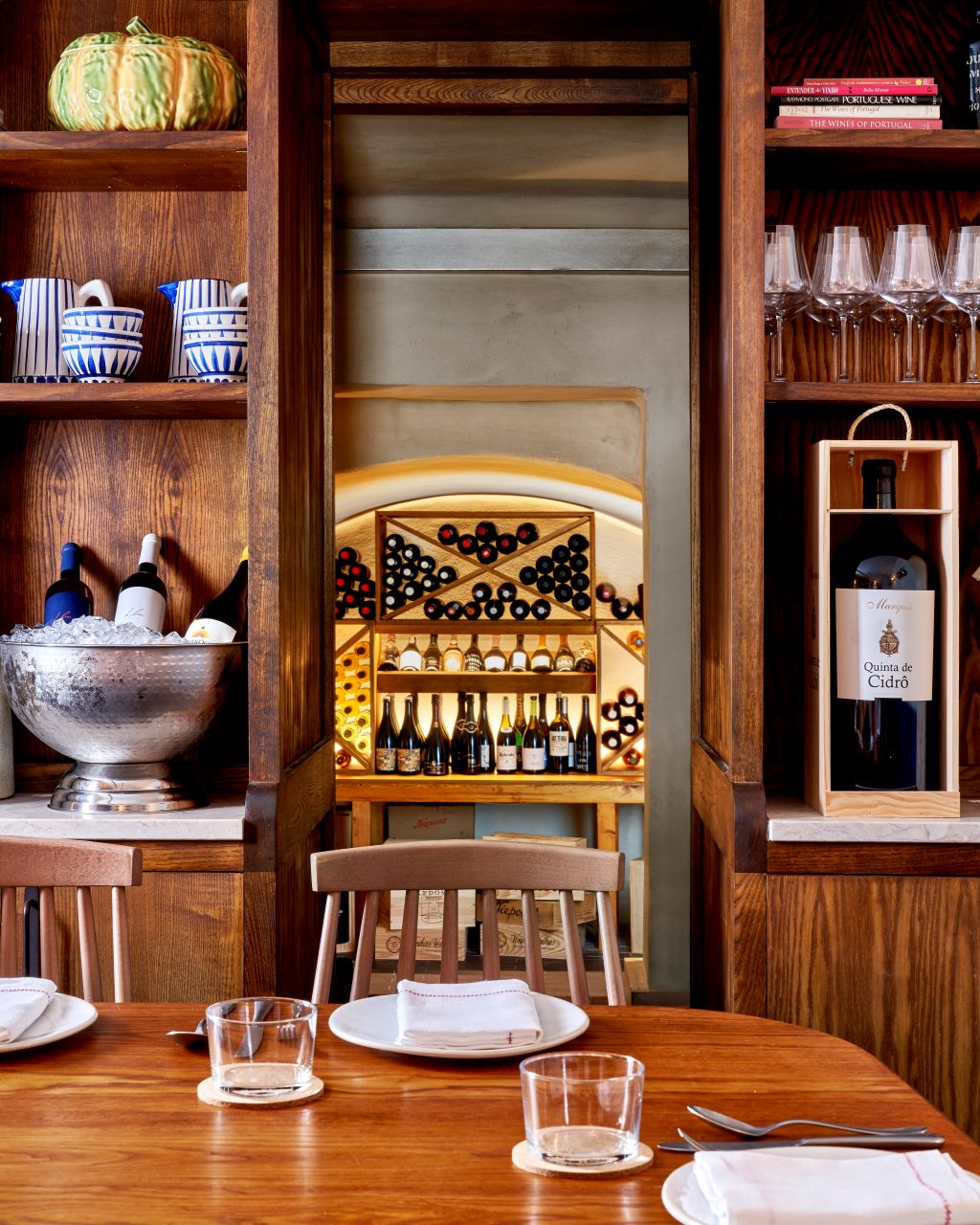 Elegant wine display in Adega Private Dining Room, perfect for sophisticated tastings and events.