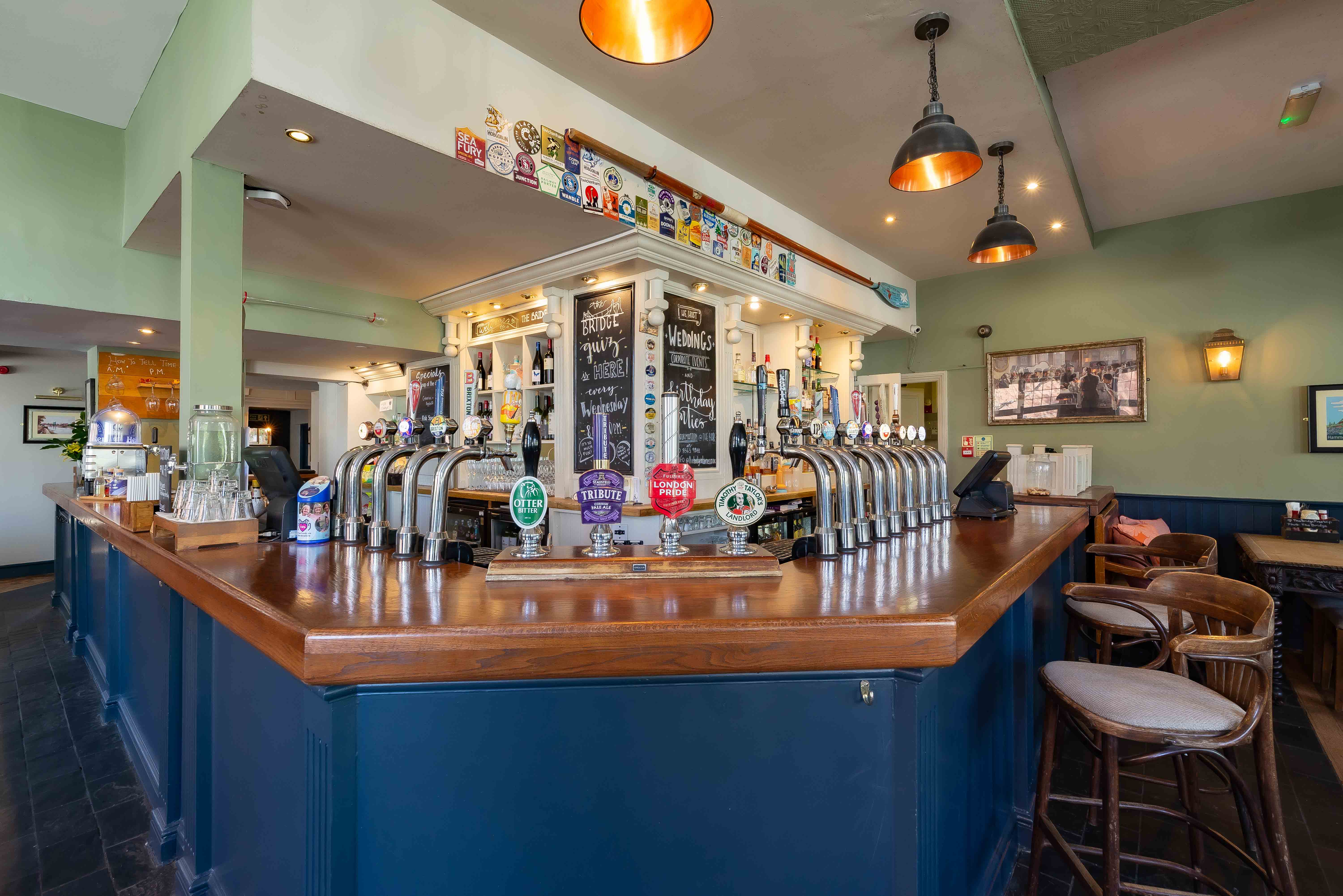 Boathouse bar area in Barnes, warm lighting for networking events and meetings.
