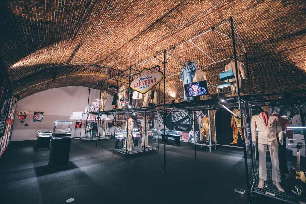 Vintage attire exhibition in unique Arches venue at London Bridge, ideal for events.