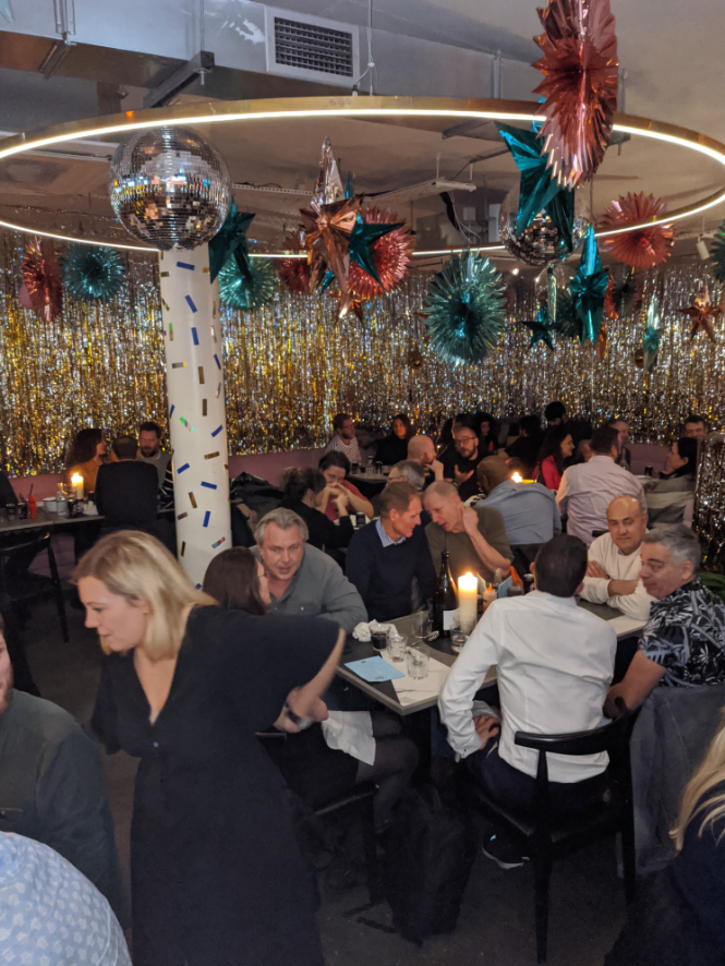 Vibrant event space at Le Bab, perfect for networking and gatherings with festive decor.