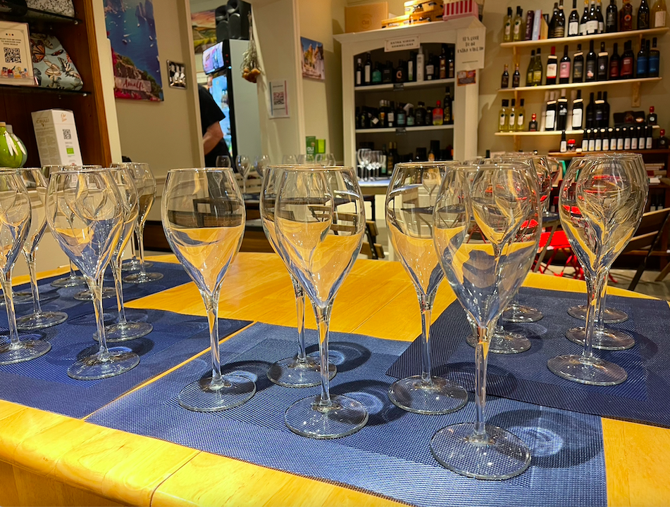 Elegant wine glasses arranged for a sophisticated tasting event in Egro' London.