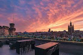 Stunning Above Rooftop venue in Newcastle with sunset, ideal for corporate events and gatherings.