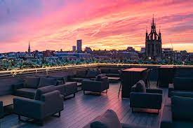 Stunning Above Rooftop venue in Newcastle with sunset, ideal for upscale events and gatherings.