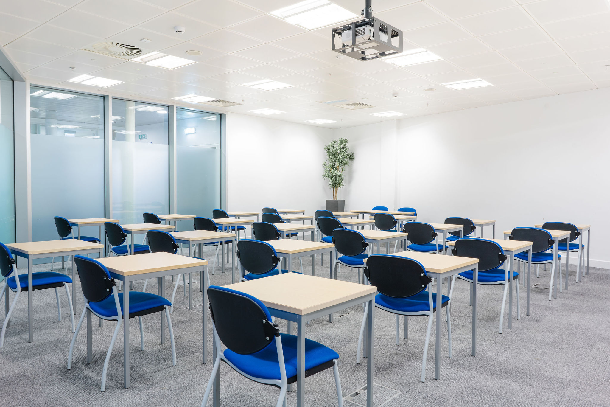 Curzon Rooms at Millennium Point, organized workshop space with projector for training sessions.