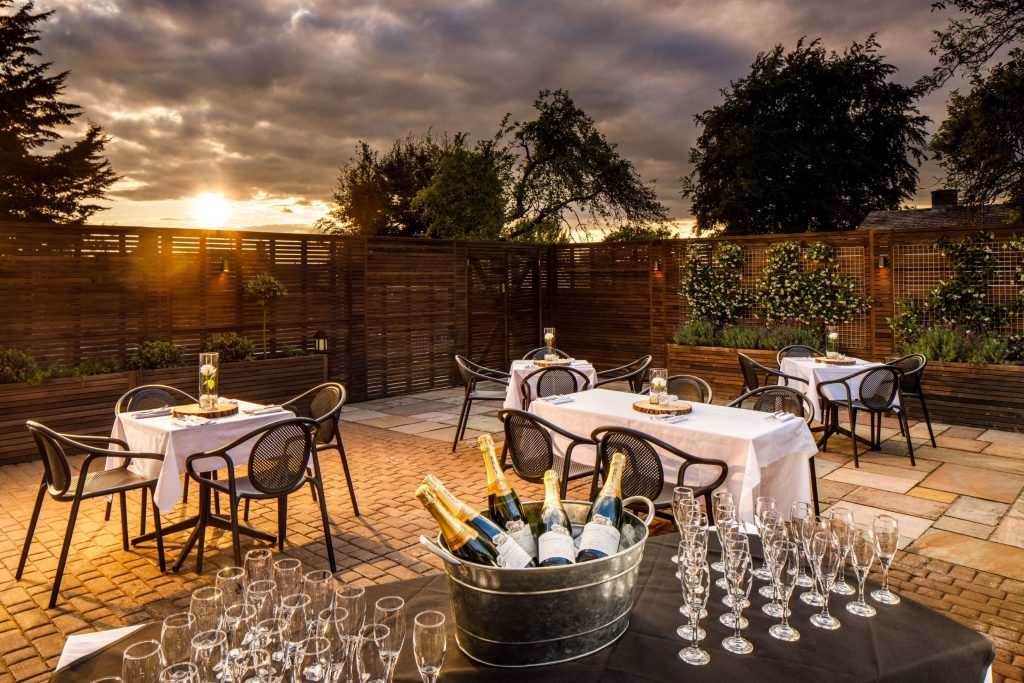 Thames Suite outdoor event space with elegant tables for upscale cocktail receptions.