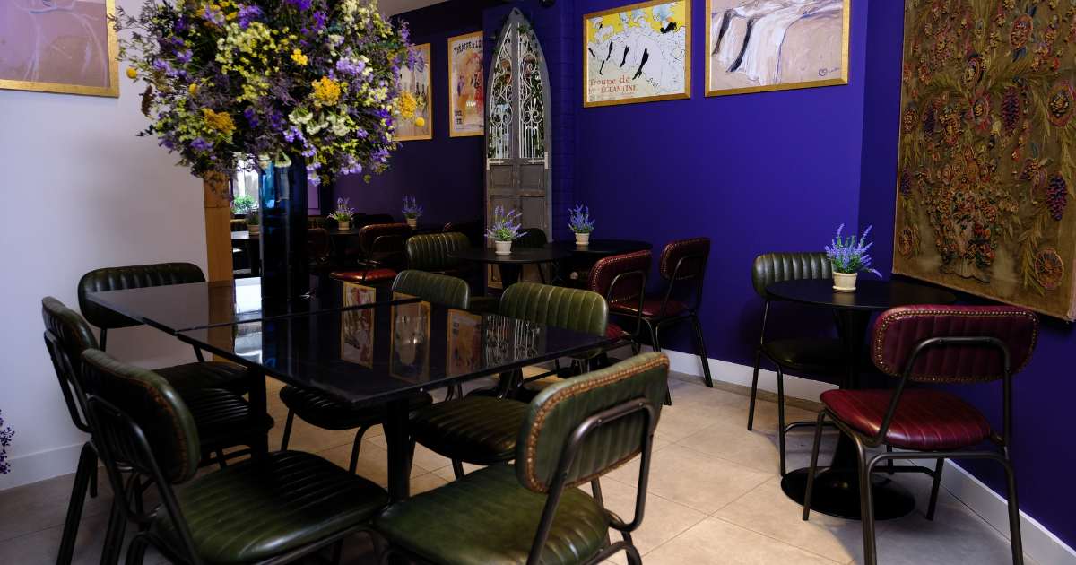 Whole Venue Exclusive Hire at Angéliques Wine House, intimate event space with floral centerpiece.