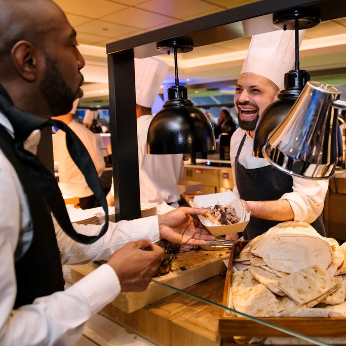 Christmas party at Tottenham Hotspur Stadium with engaging culinary experience and networking.