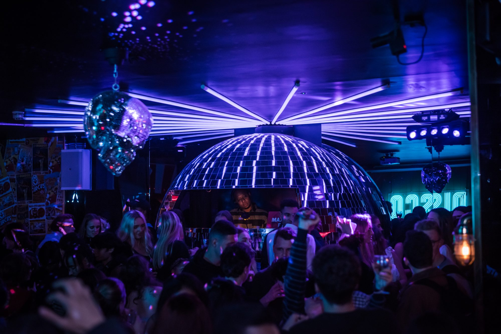 Vibrant function room with disco ball, perfect for parties and corporate events.