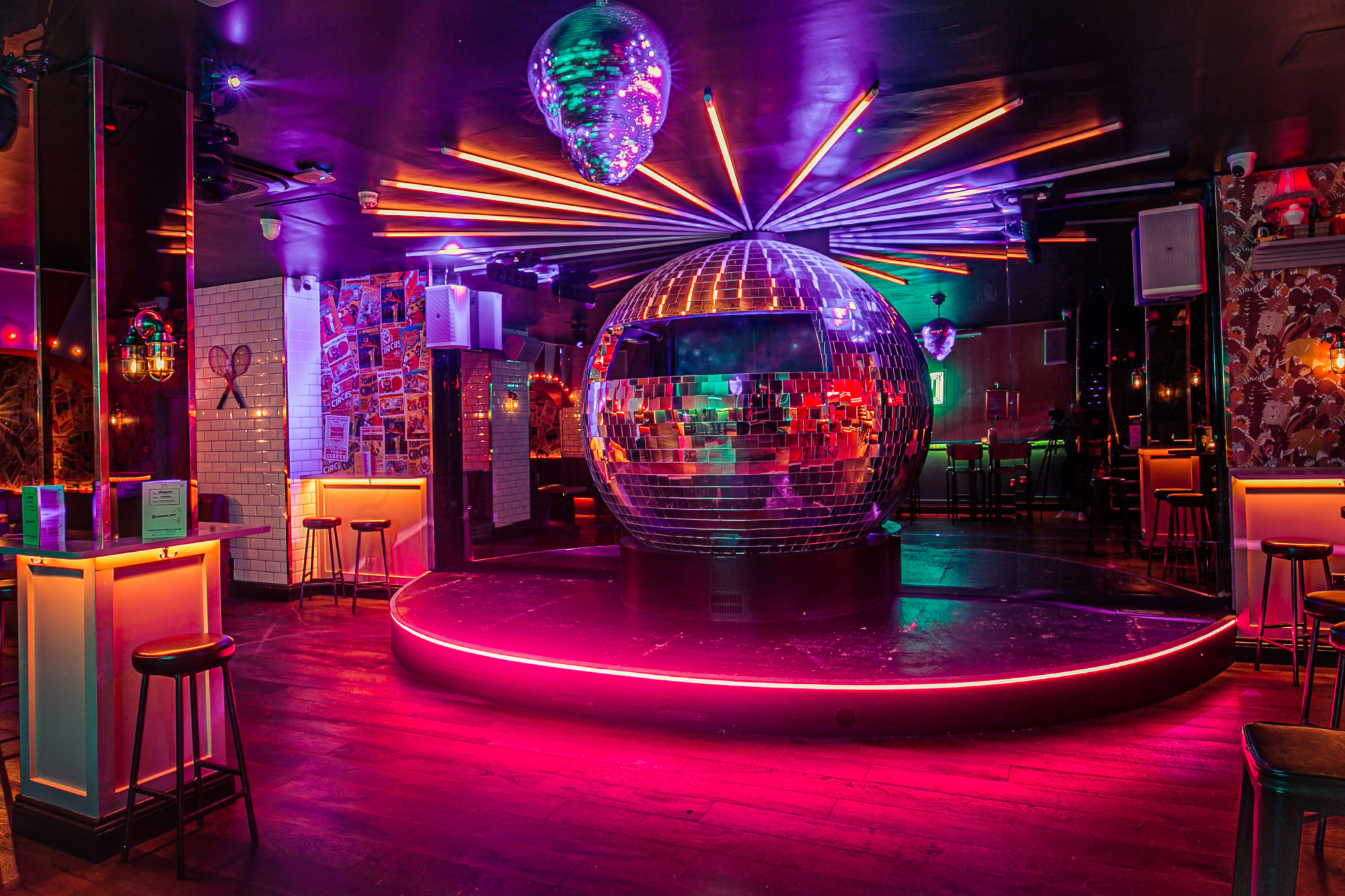 Vibrant event space with a disco ball, perfect for parties and celebrations in Simmons Holborn.
