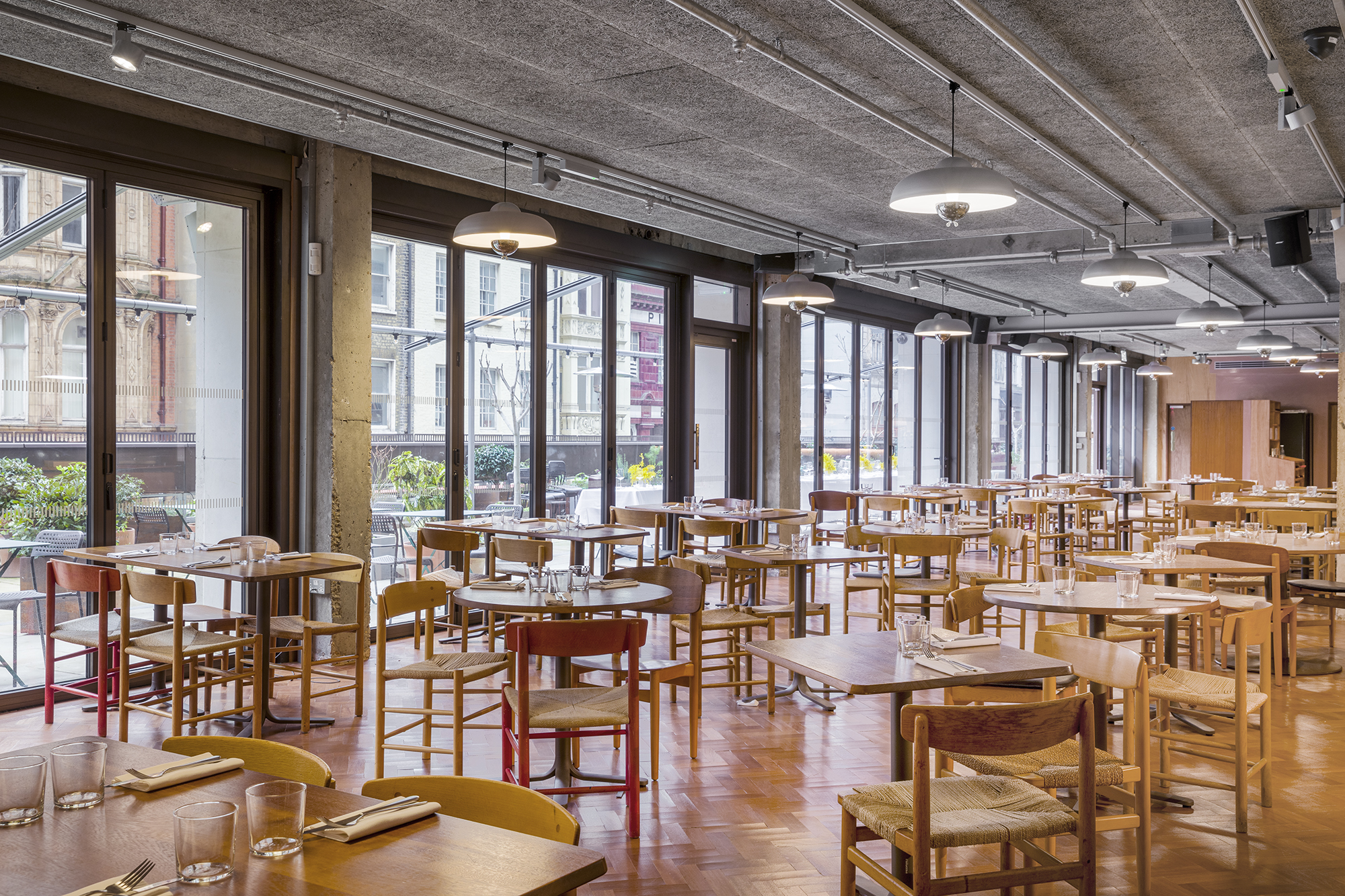 Modern dining area in Toklas Restaurant, perfect for networking events and private functions.