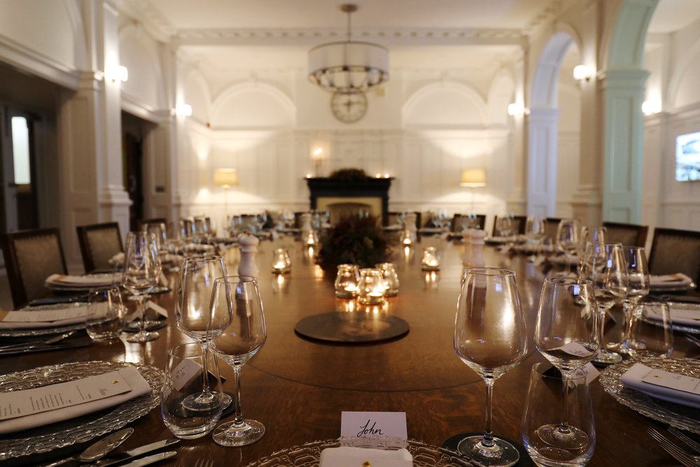 Elegant dining room with fine china, perfect for corporate dinners and intimate gatherings.