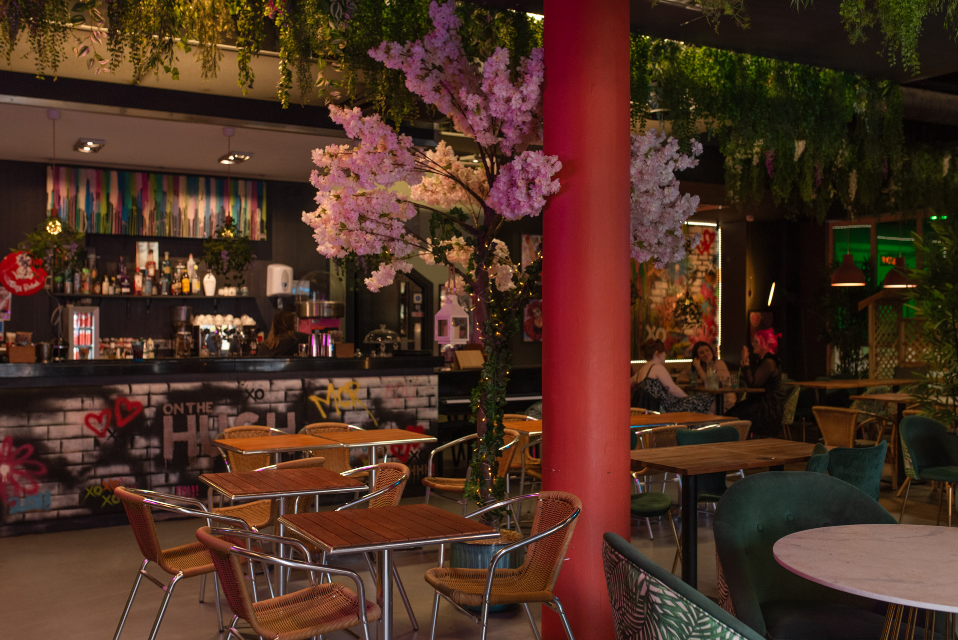 Vibrant event venue with cherry blossoms, ideal for meetings and gatherings.