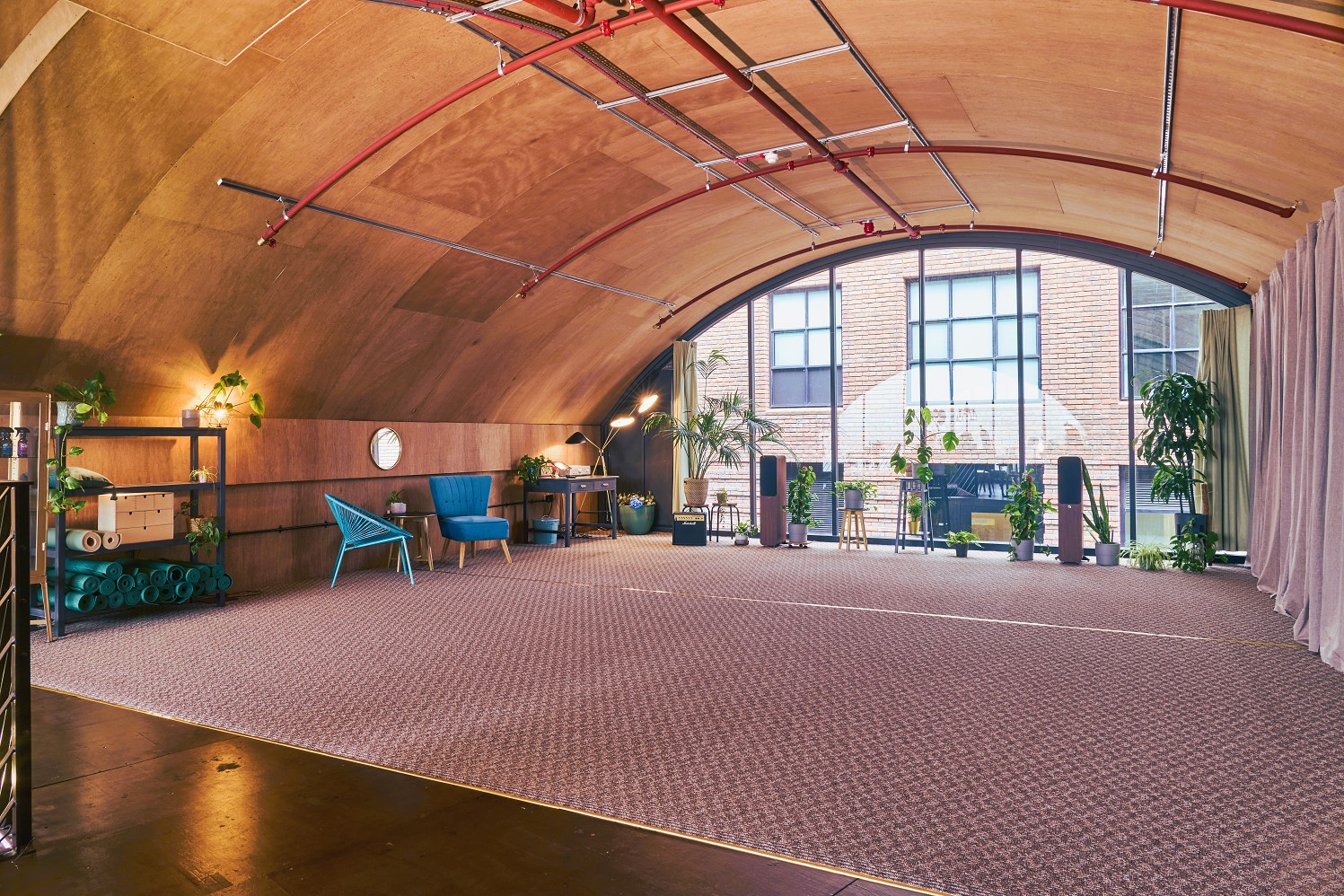 Self-Retreat Studio with arched ceiling, ideal for creative workshops and events.