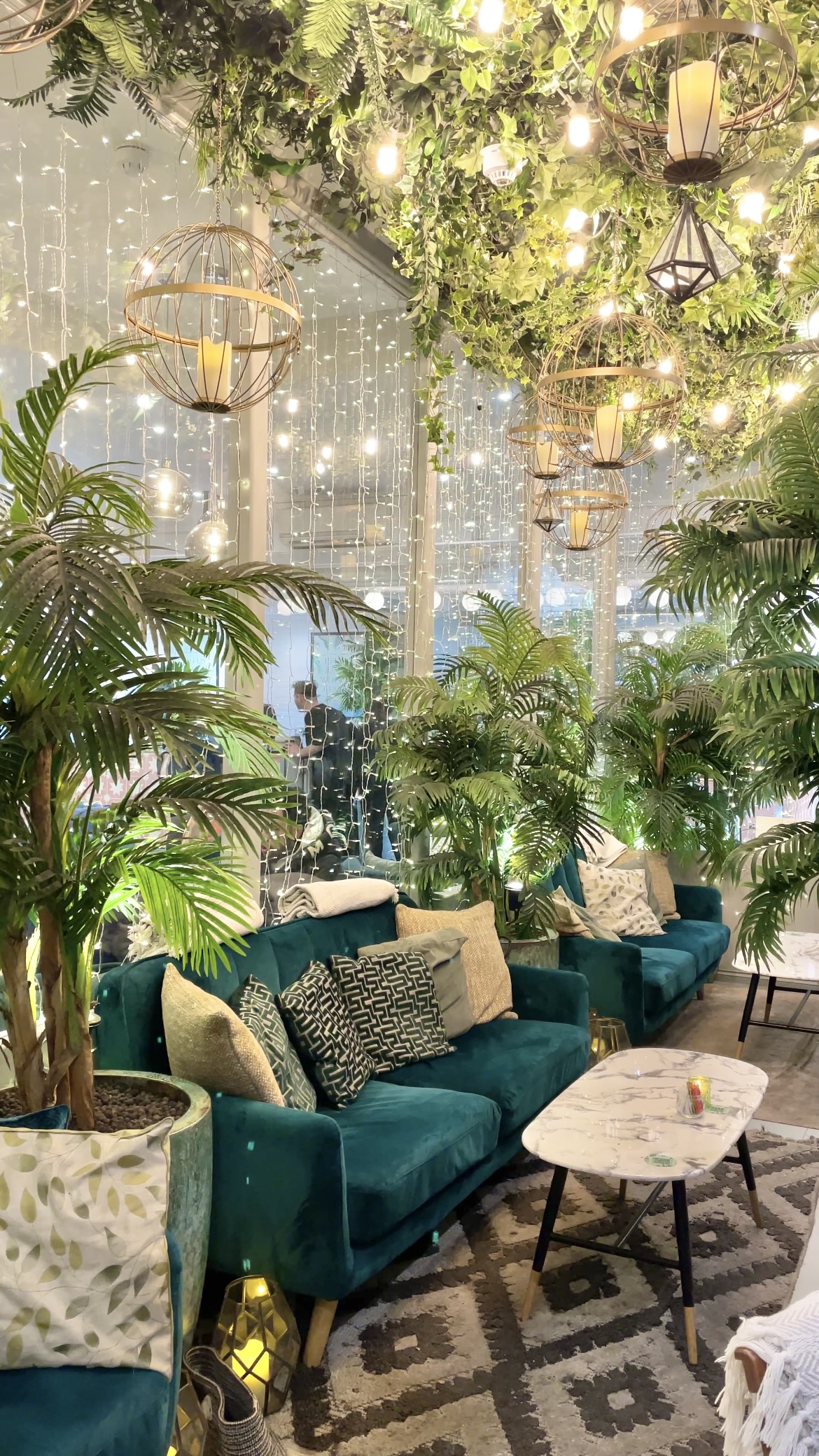 Elegant lounge area with lush greenery for networking events at The Terrace Knightsbridge.