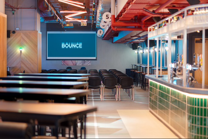 Versatile conference space with modern decor for seminars and networking events.