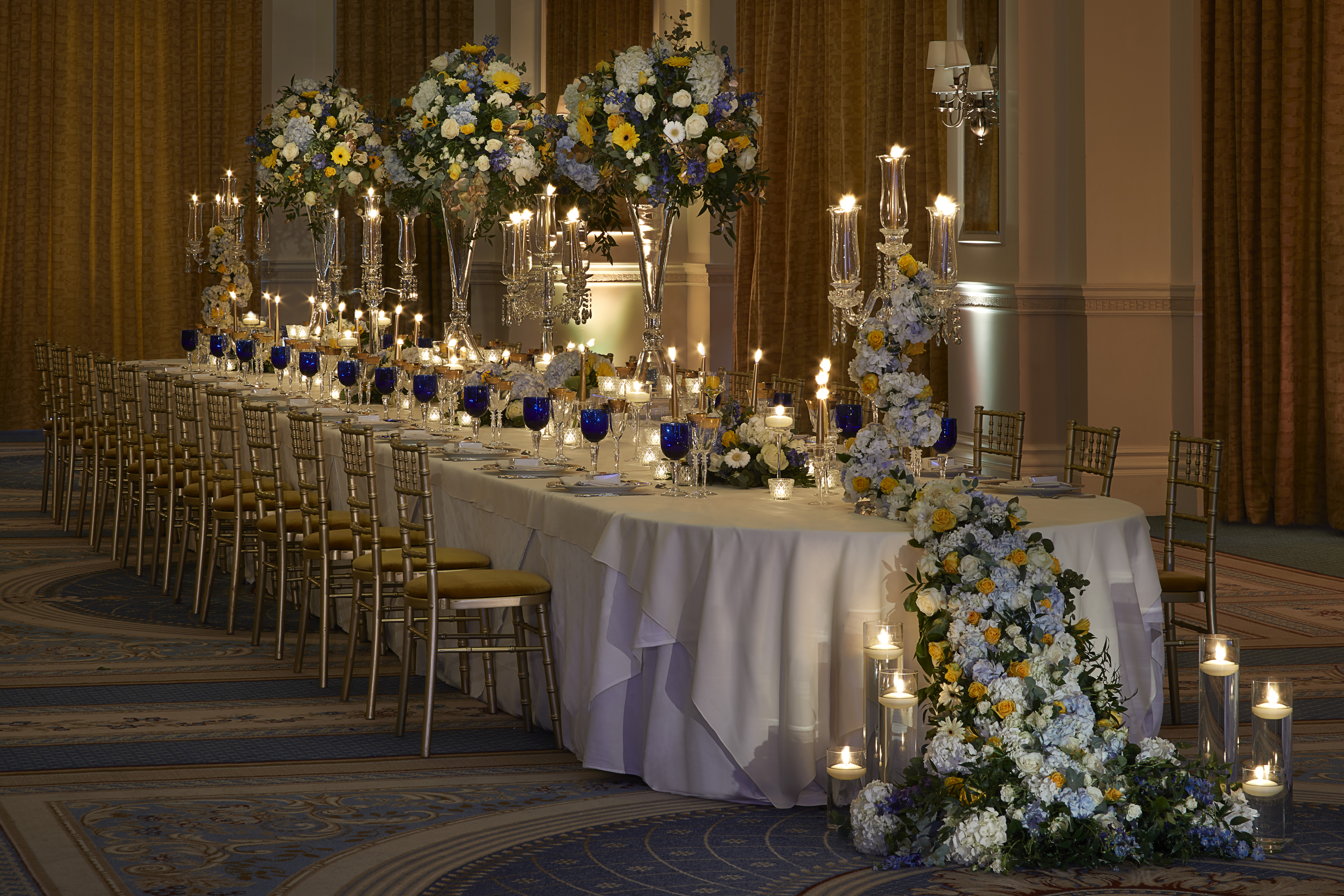 Elegant banquet table with floral centerpieces at The Landmark London for weddings and galas.