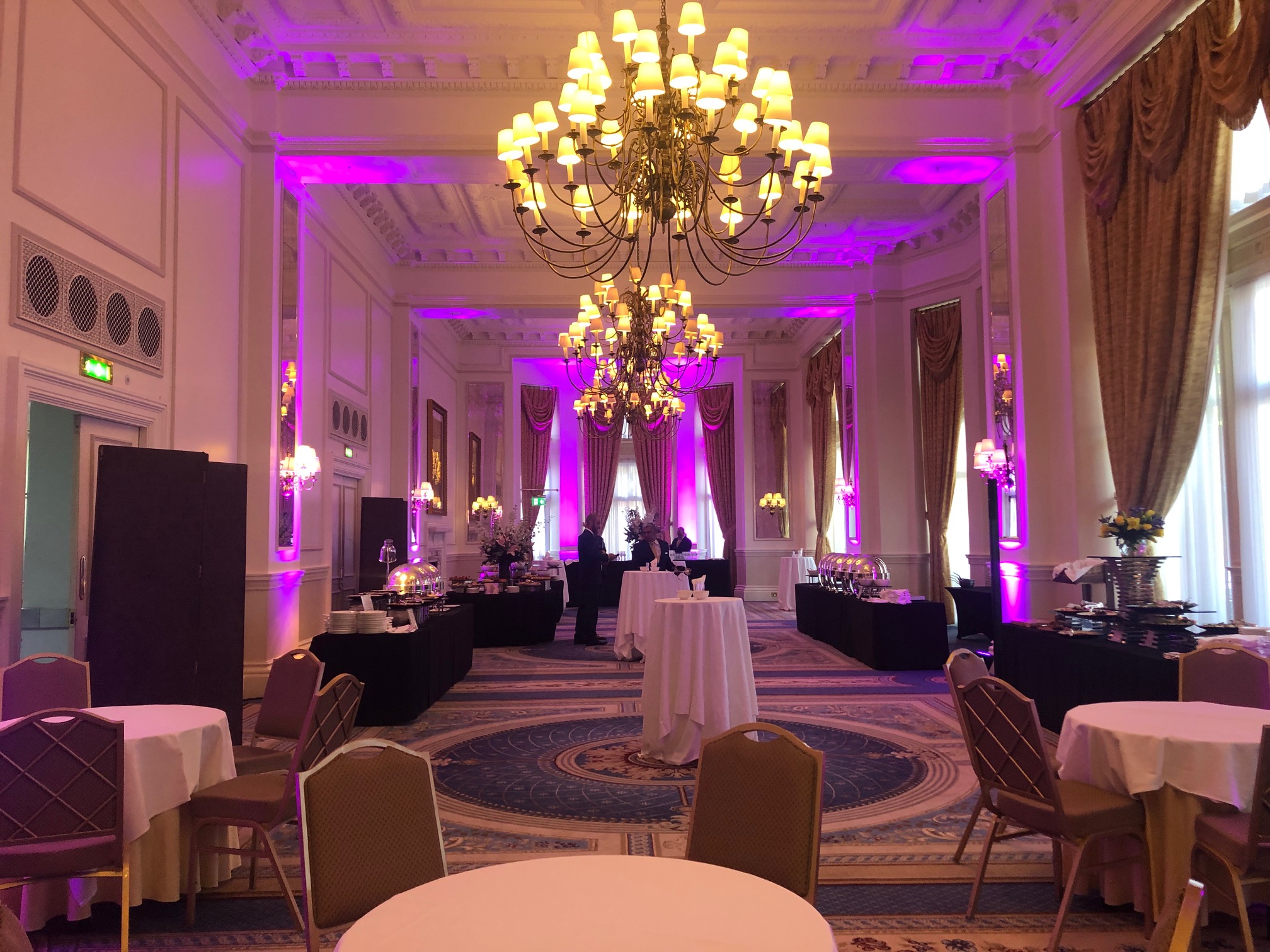 Elegant Empire Room at The Landmark London, featuring a chandelier for corporate events.
