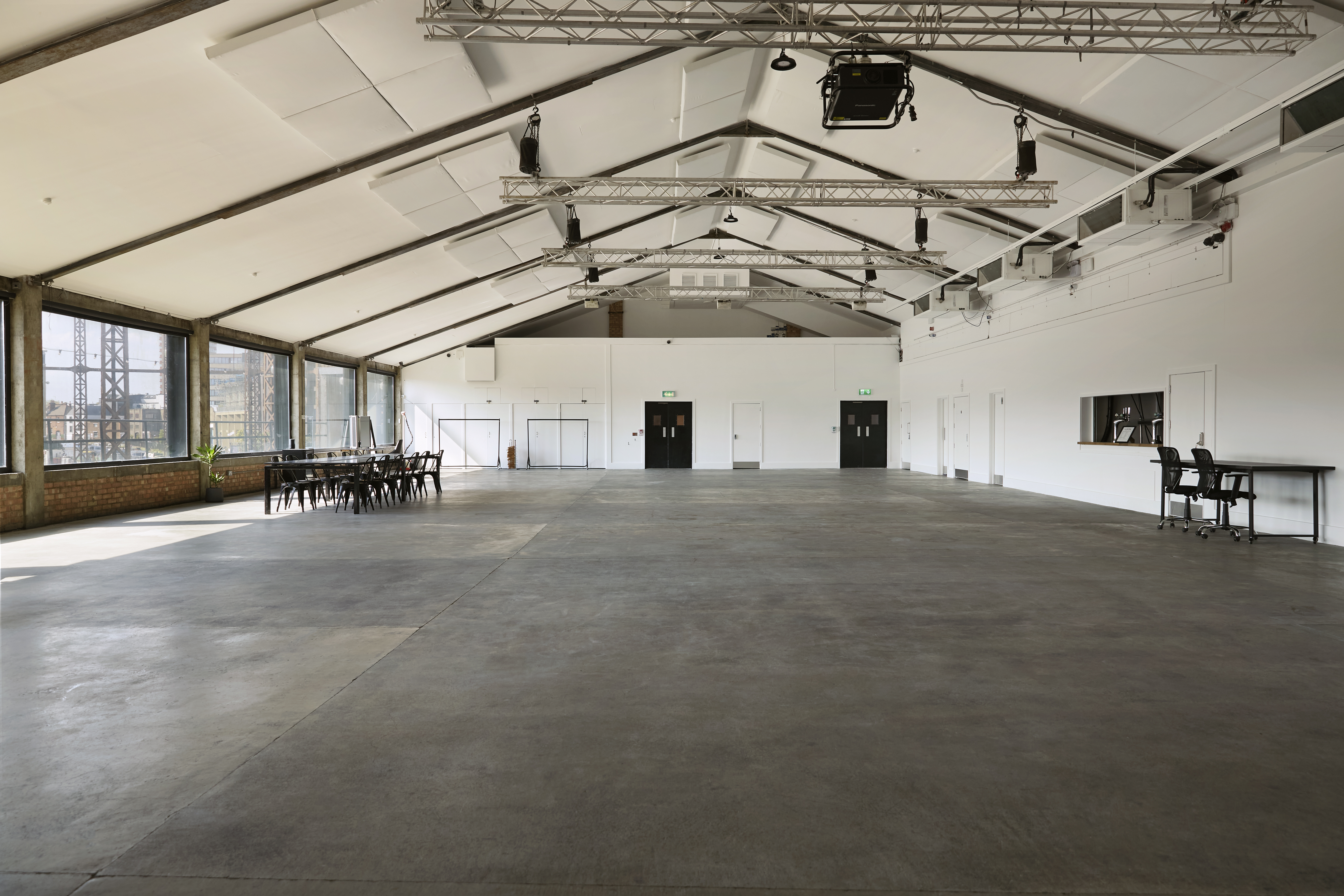 Spacious Lock Warehouse venue with high ceilings for conferences and workshops.